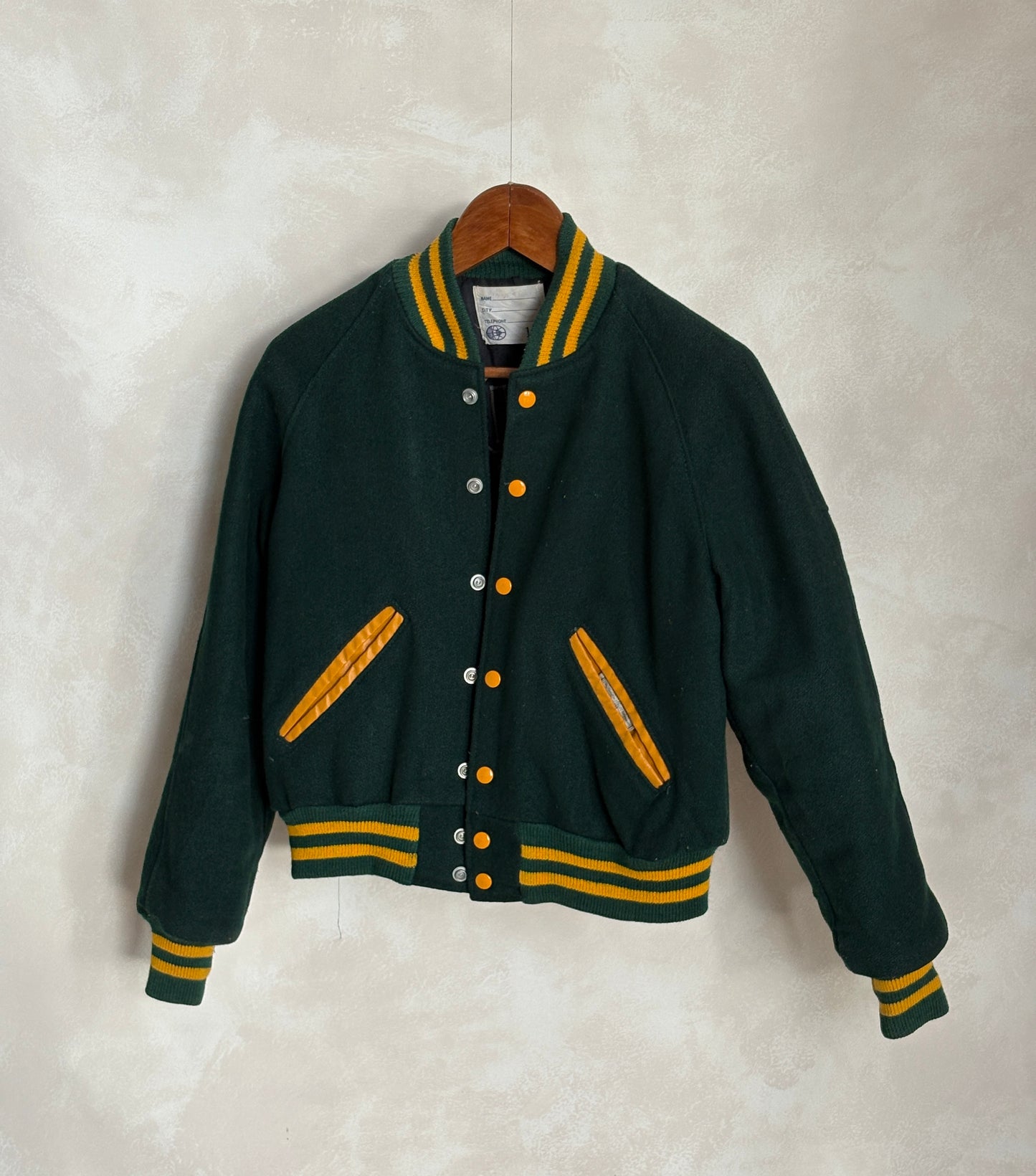 Size 18. Green Vintage 70s varsity jacket Made in USA