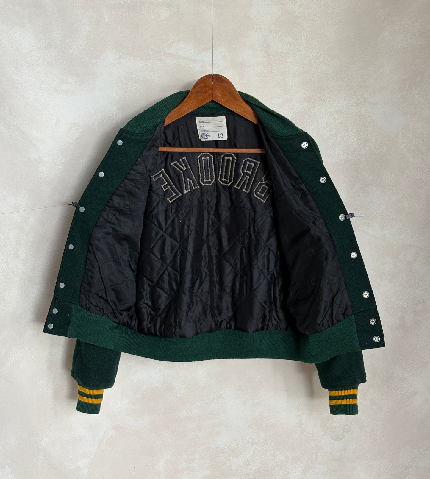 Size 18. Green Vintage 70s varsity jacket Made in USA