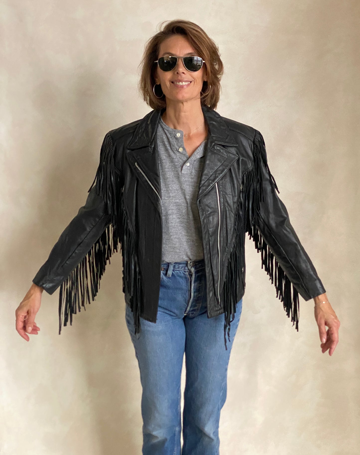 Size Small. Vintage leather fringe motorcycle jacket Made in USA