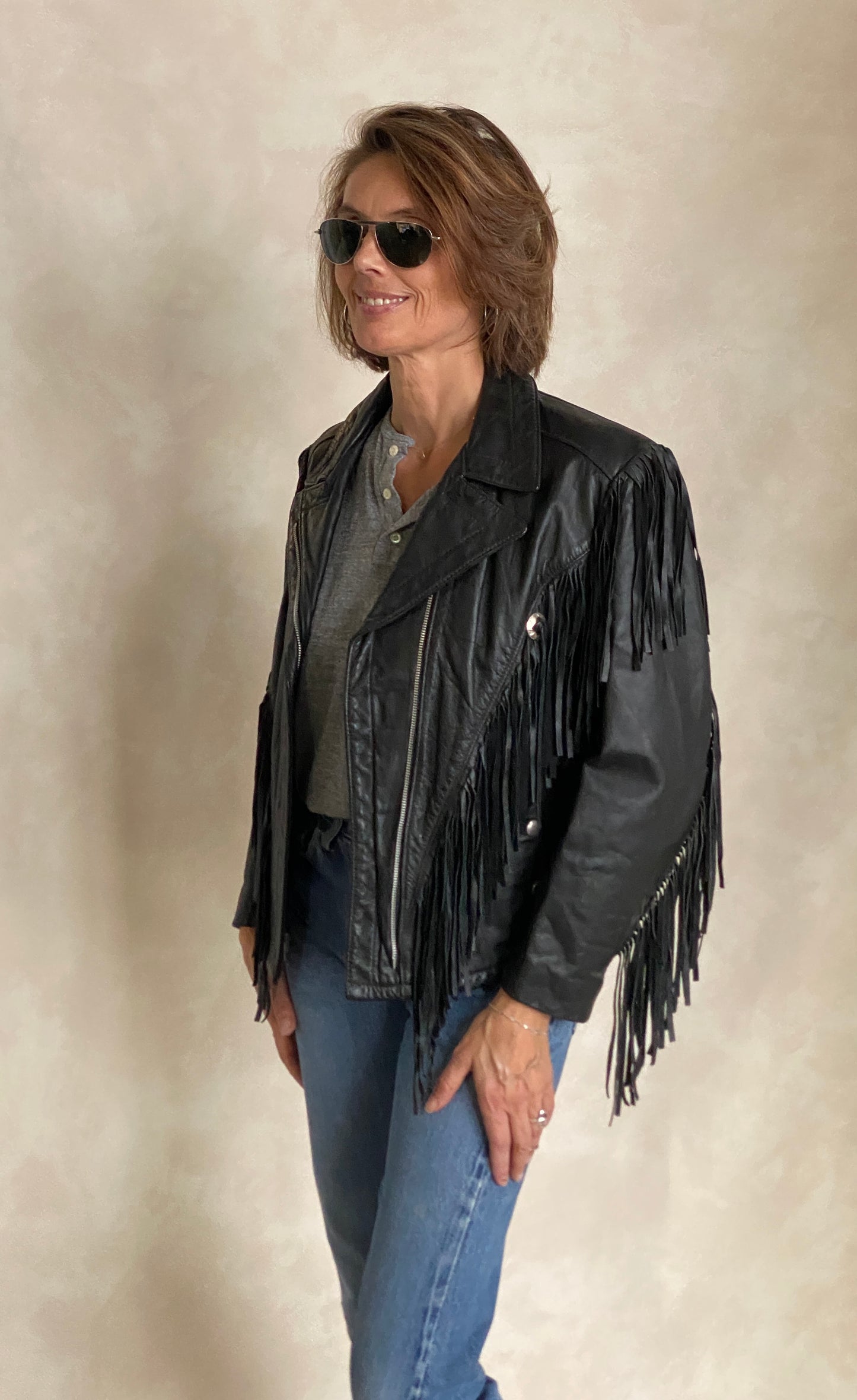 Size Small. Vintage leather fringe motorcycle jacket Made in USA