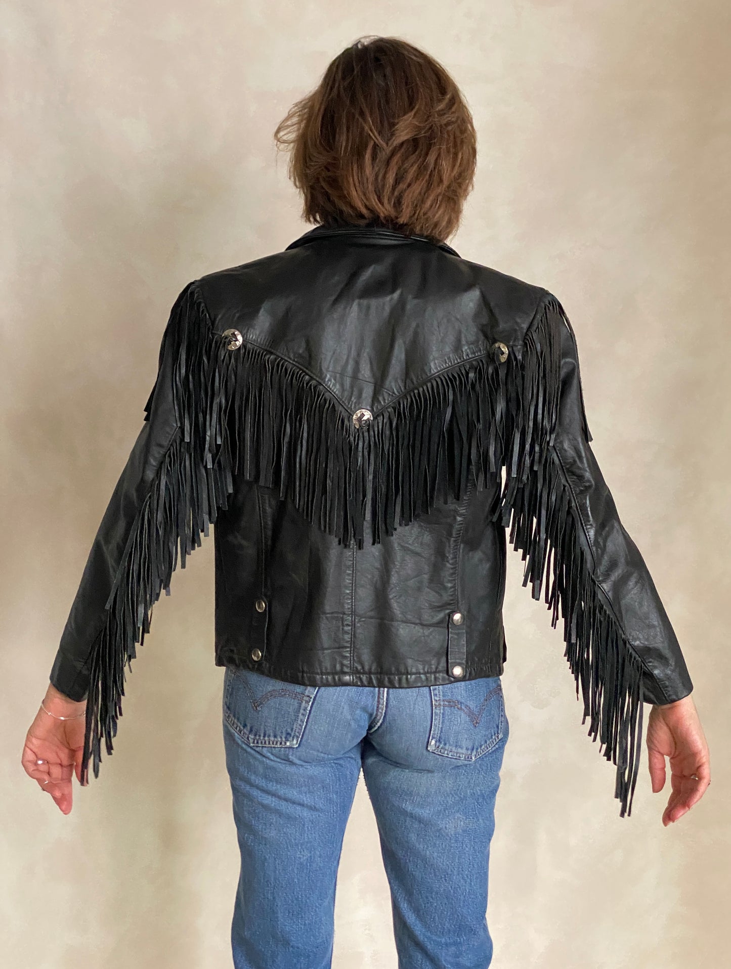Size Small. Vintage leather fringe motorcycle jacket Made in USA