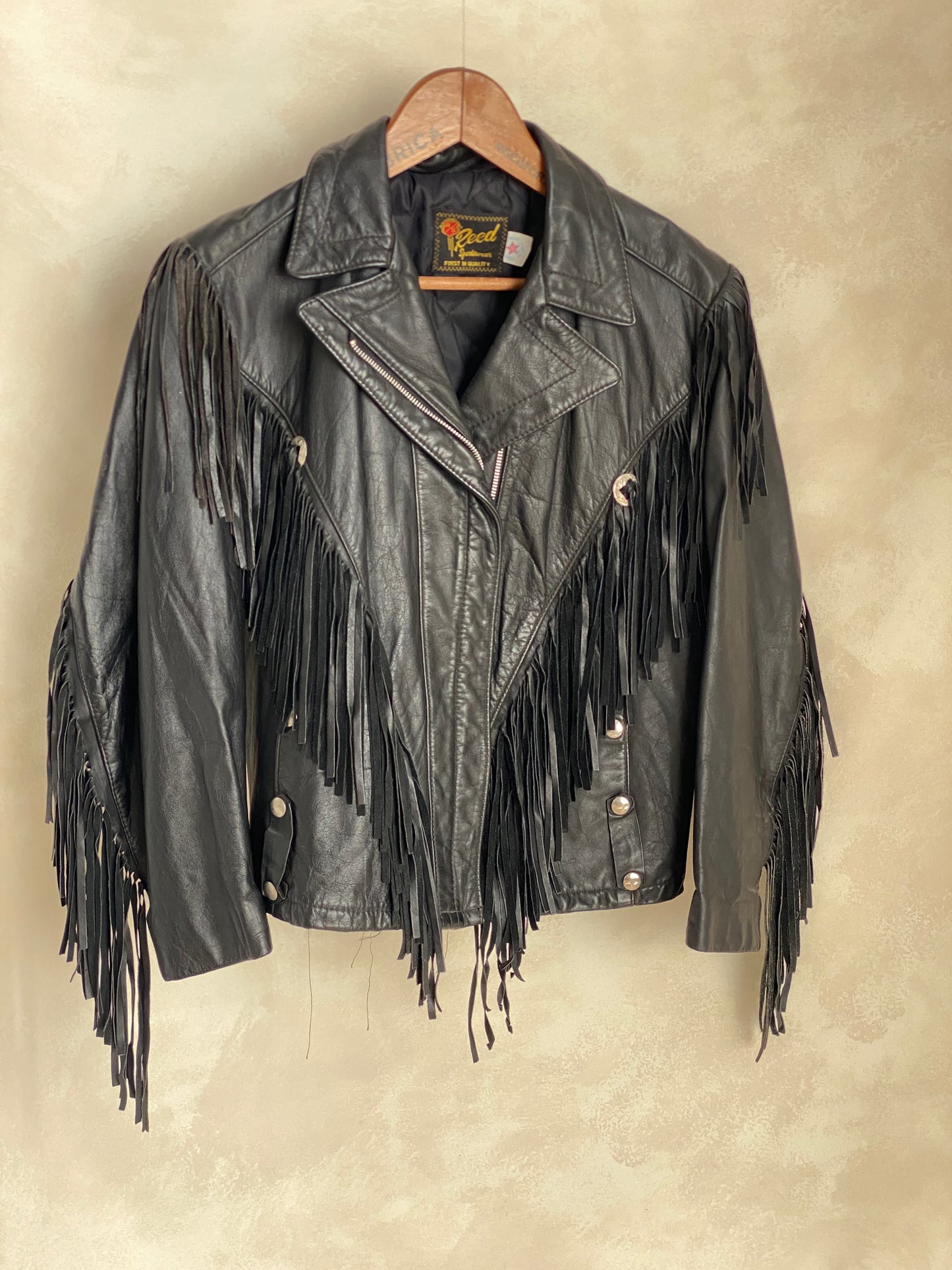 Size Small. Vintage leather fringe motorcycle jacket Made in USA