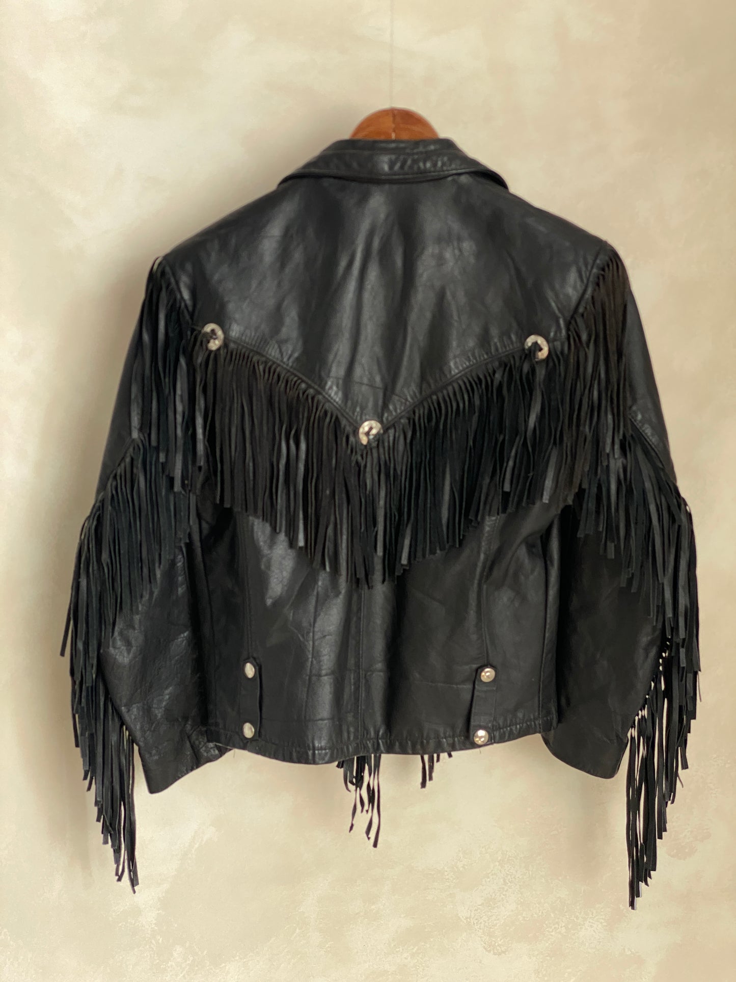 Size Small. Vintage leather fringe motorcycle jacket Made in USA
