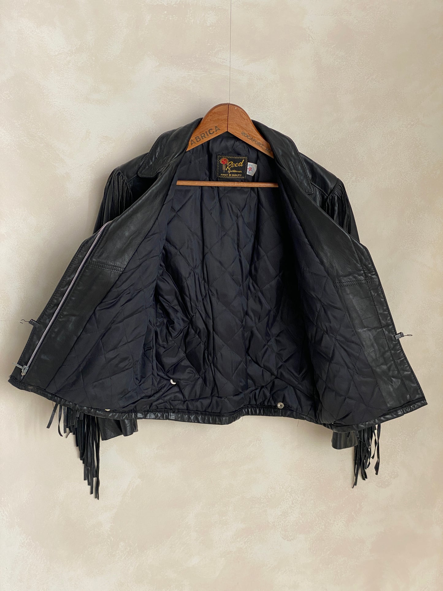 Size Small. Vintage leather fringe motorcycle jacket Made in USA