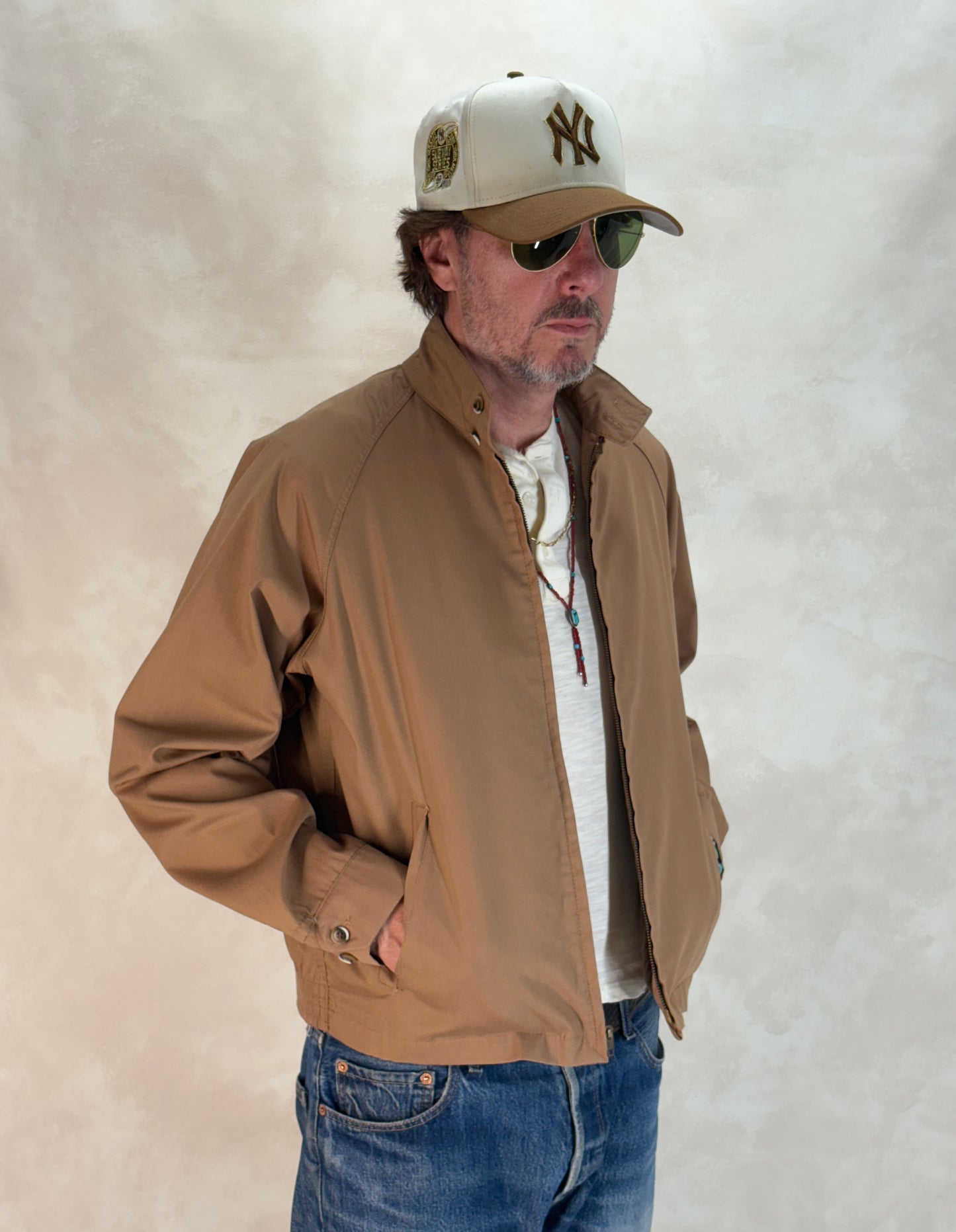 Size 42US / 52EU , 70s Light jacket made by English Squire .