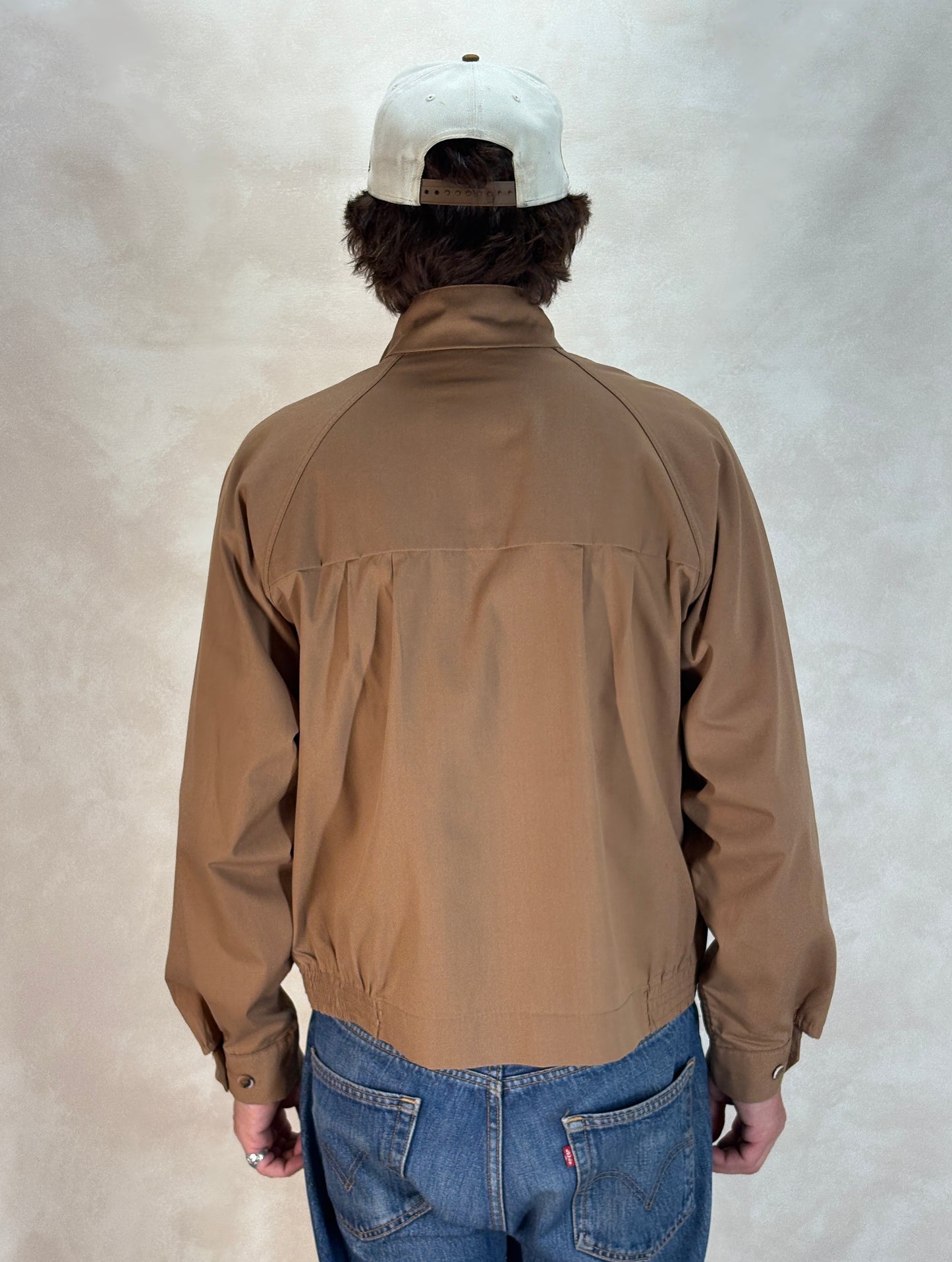 Size 42US / 52EU , 70s Light jacket made by English Squire .