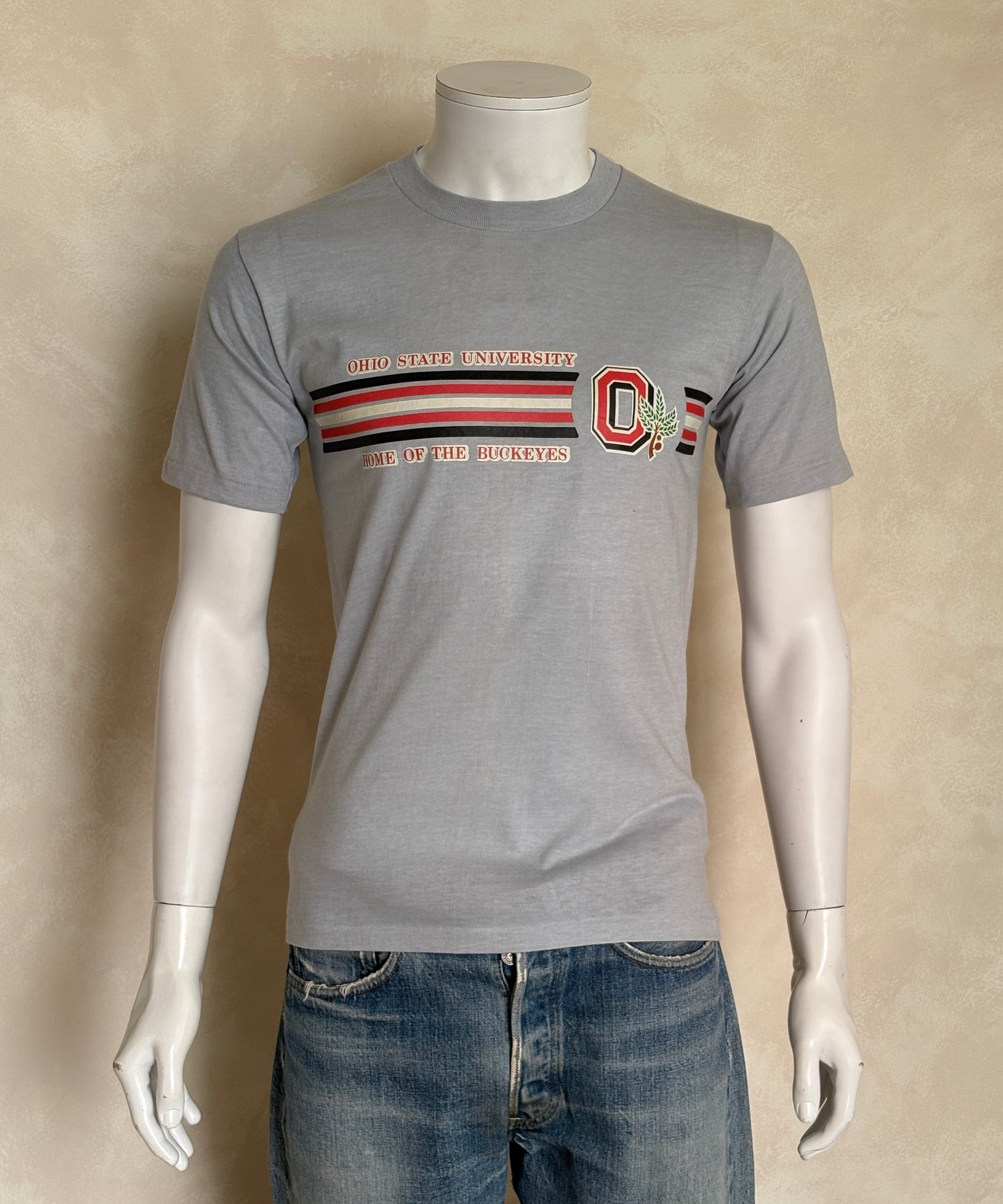 Vintage Ohio State University tee – bold Buckeyes pride with classic athletic stripes. Med