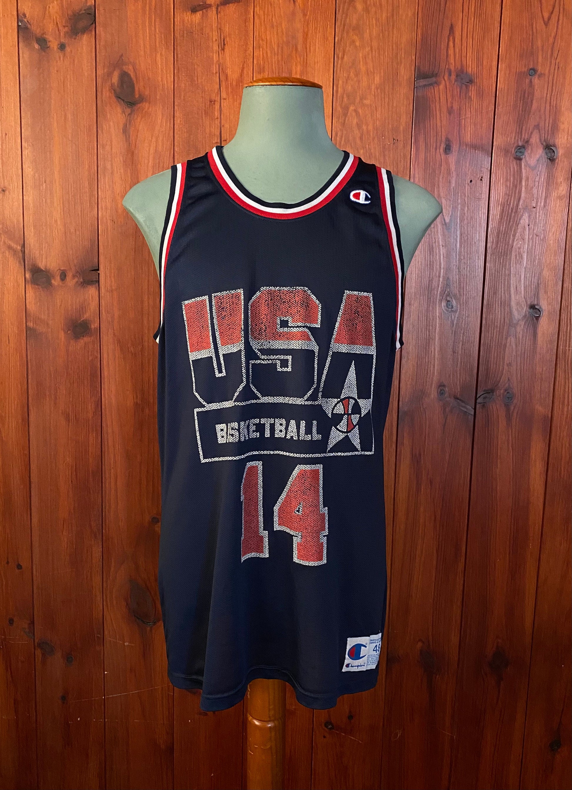 Vintage distressed 90s USA Team Champion NBA jersey with player Mourning #14, size 48 - front view.