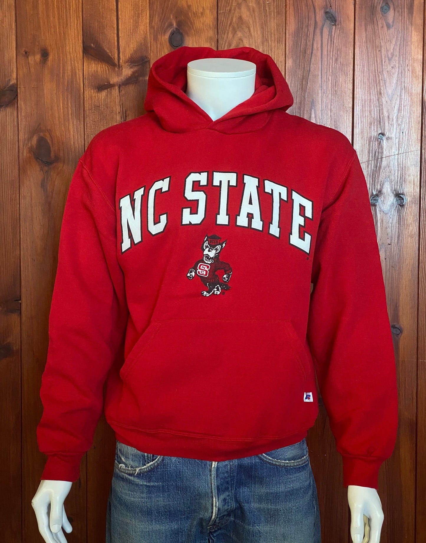 Size M. Vintage NC State 90s hooded sweatshirt made by Russell Athletic