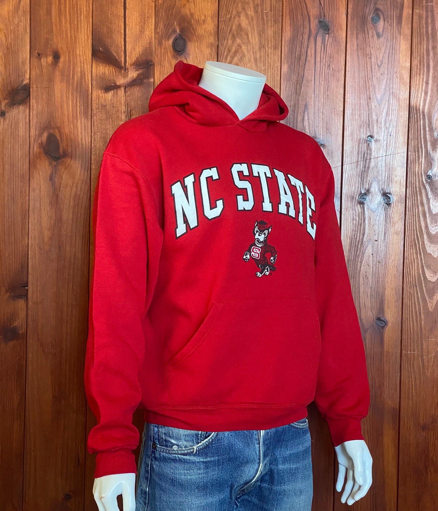 Size M. Vintage NC State 90s hooded sweatshirt made by Russell Athletic
