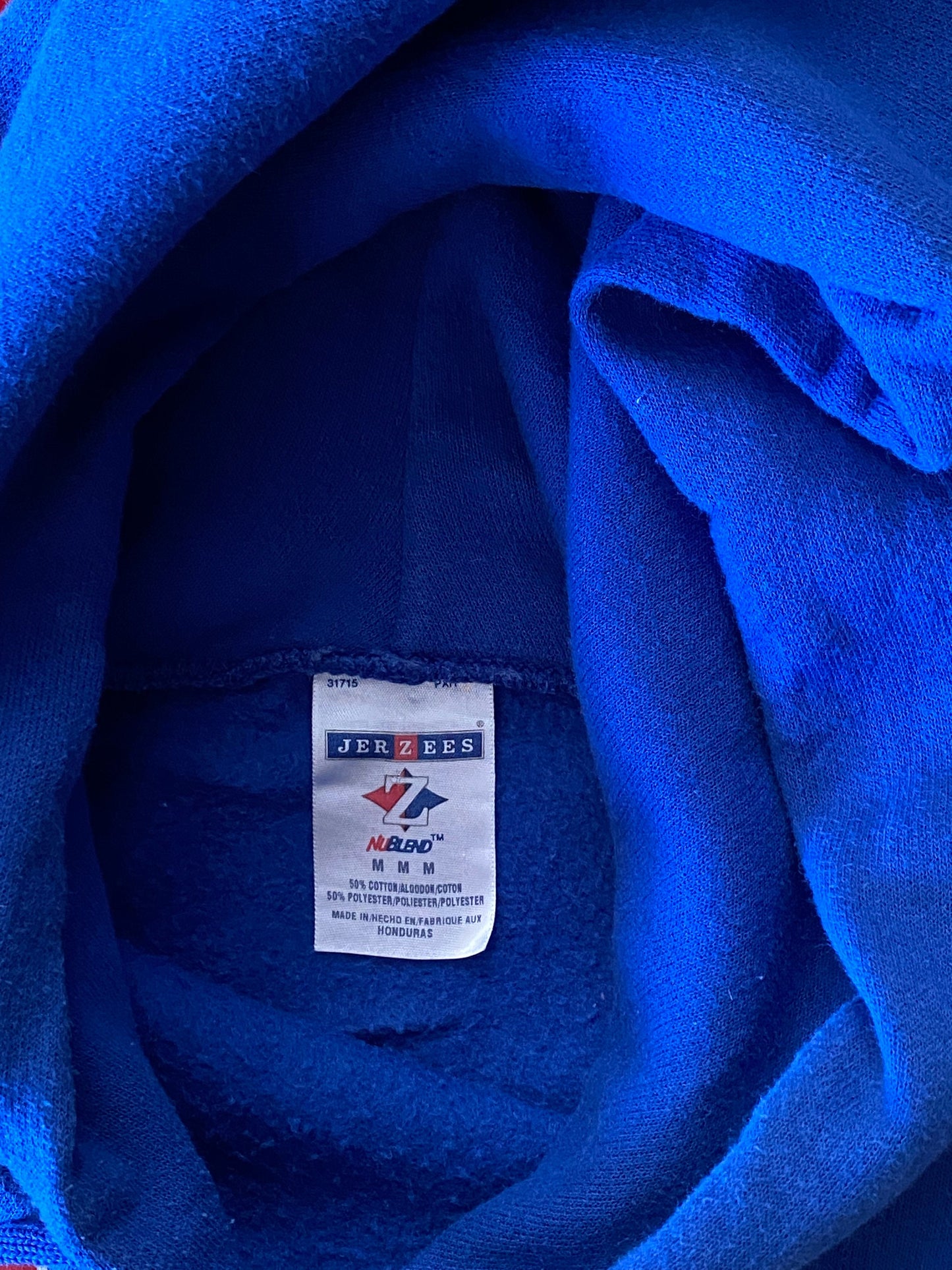 Vintage hooded sweatshirt by Jerzees, size M - Classic comfort and style for your wardrobe.