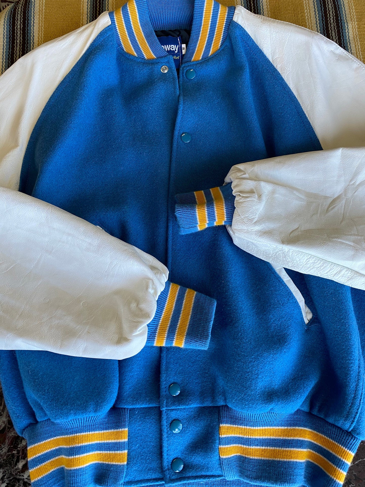 Size Medium. Leather sleeve Vintage 90s Varsity jacket Made In USA