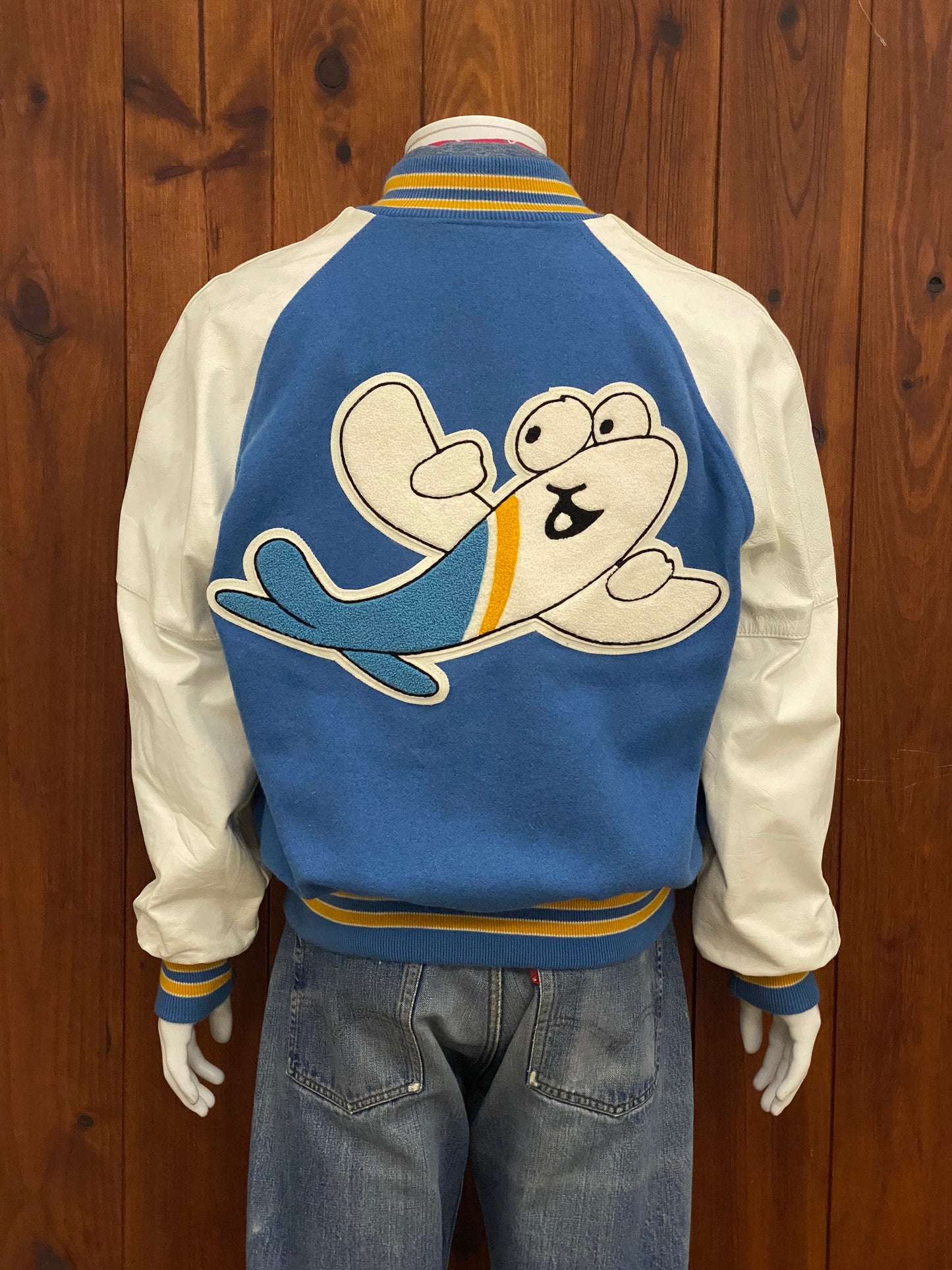 Size Medium. Leather sleeve Vintage 90s Varsity jacket Made In USA