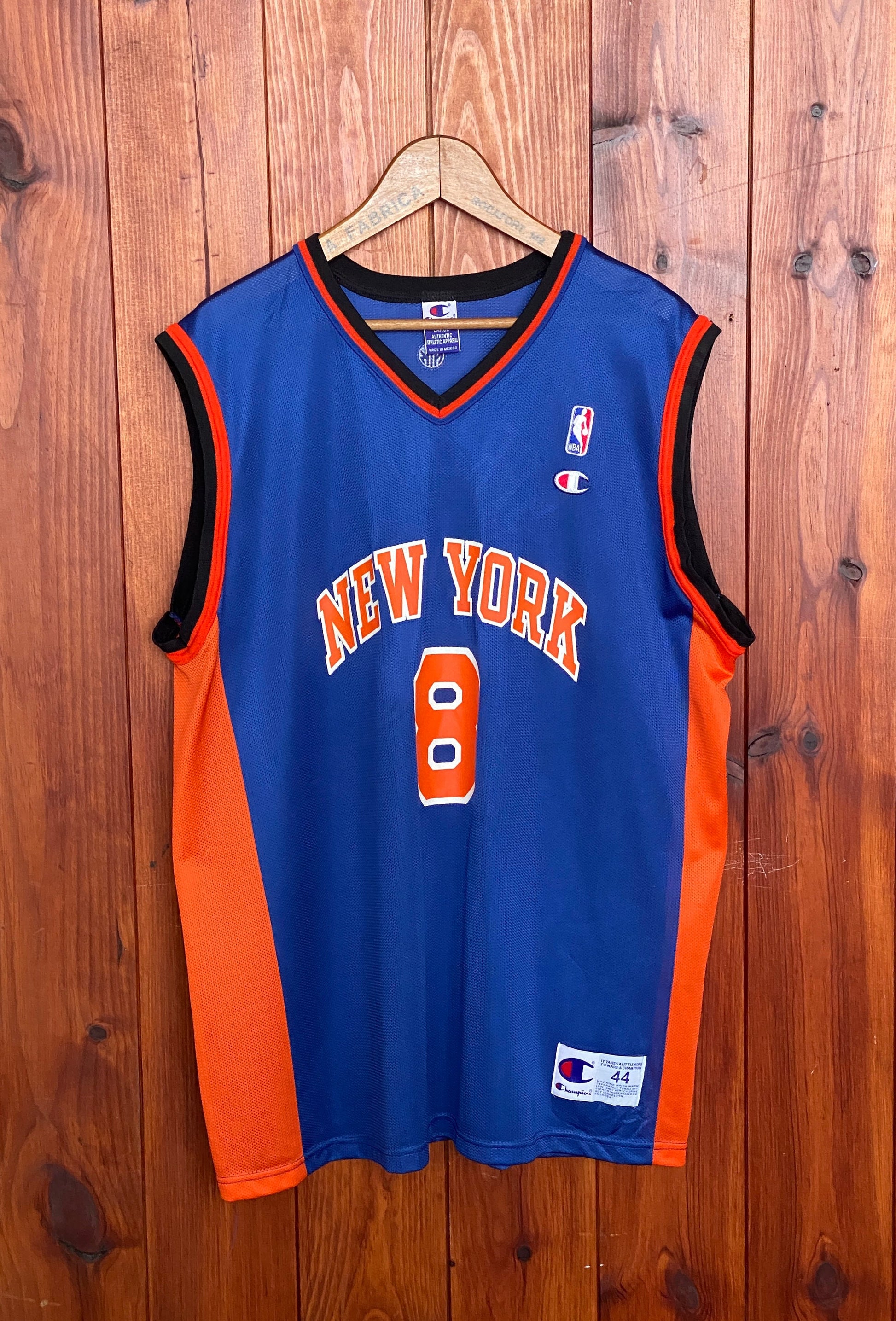 Vintage 90s Champion New York Knicks Latrell Sprewell #8 NBA jersey, size 44 - front view.