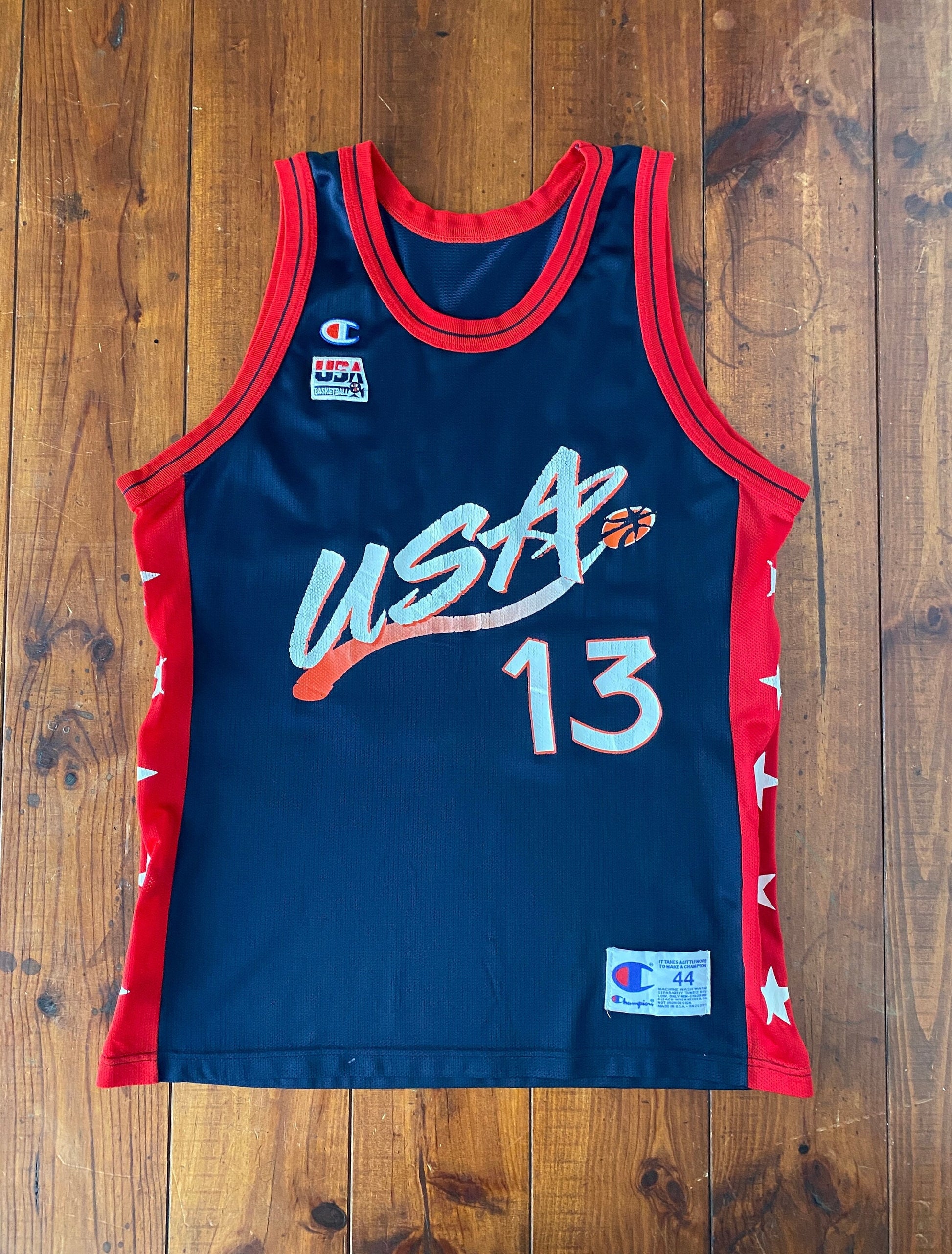 Vintage 90s NBA Champion USA Olympics Dream Team jersey, size 44, featuring Shaq O'Neal #13 - front view. Made in USA.
