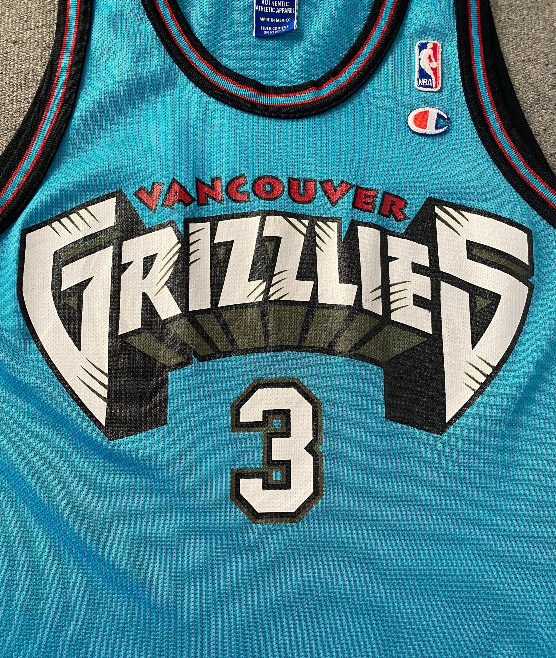 Vintage 90s NBA Grizzlies Abdur-Rahim #3 Champion jersey, size 44 - front view.