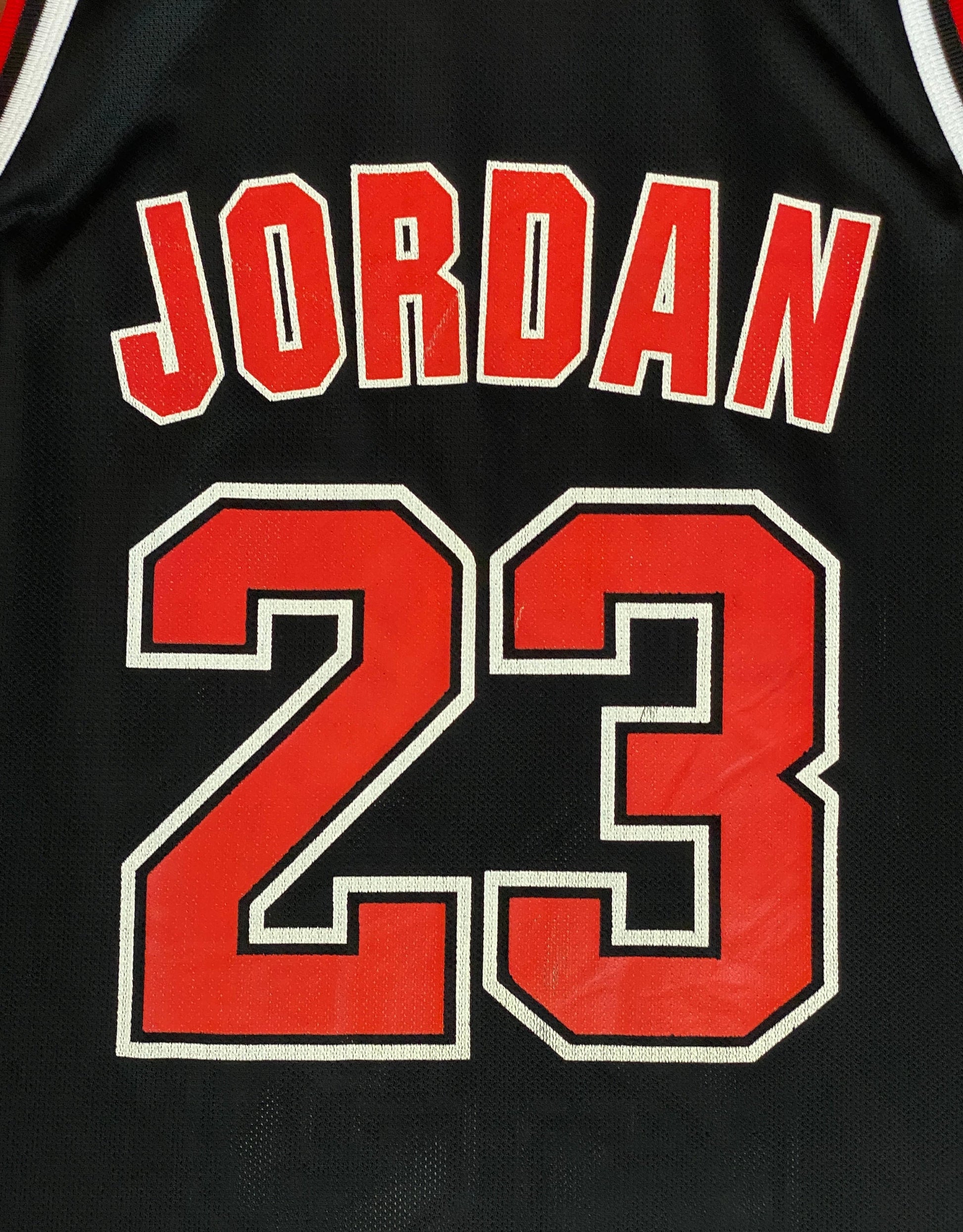 Vintage 90s NBA Chicago Bulls Michael Jordan #23 jersey, size 44 - back view. Made in USA by Champion.