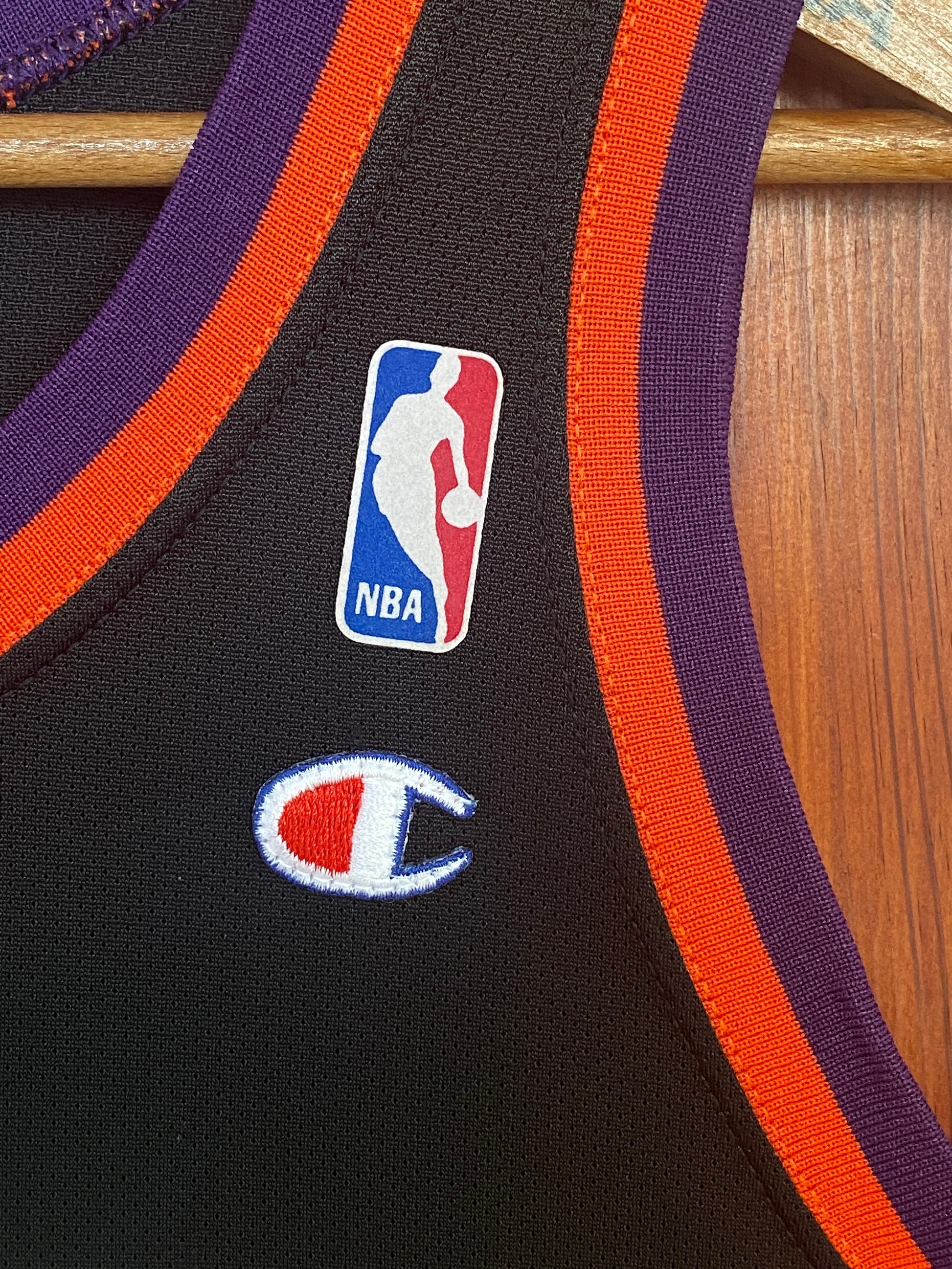 Vintage 90s NBA Phoenix Suns Charles Barkley #34 jersey, size 44 - front view. Made in USA by Champion.