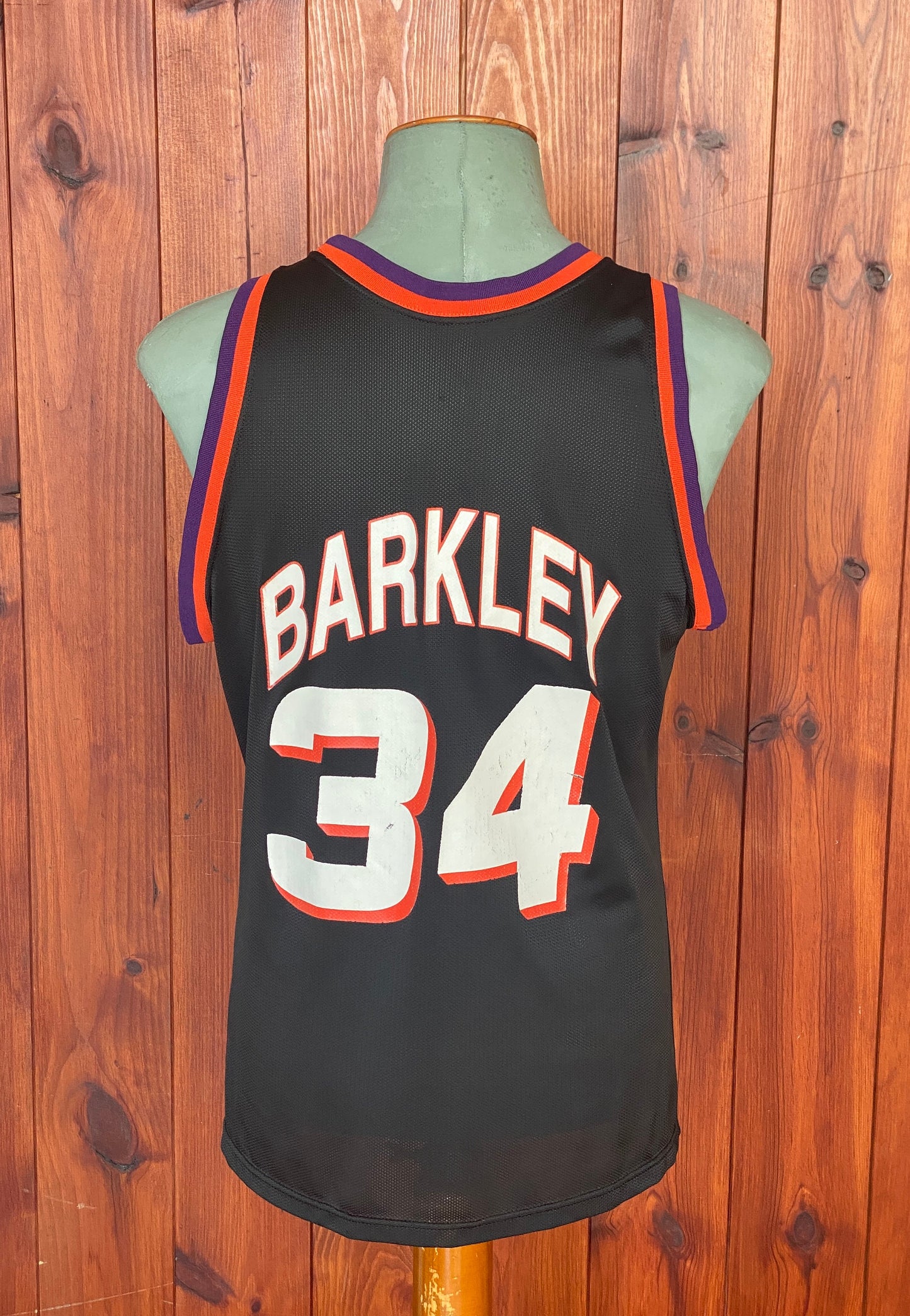 Vintage 90s NBA Phoenix Suns Charles Barkley #34 jersey, size 44 - back view. Made in USA by Champion.