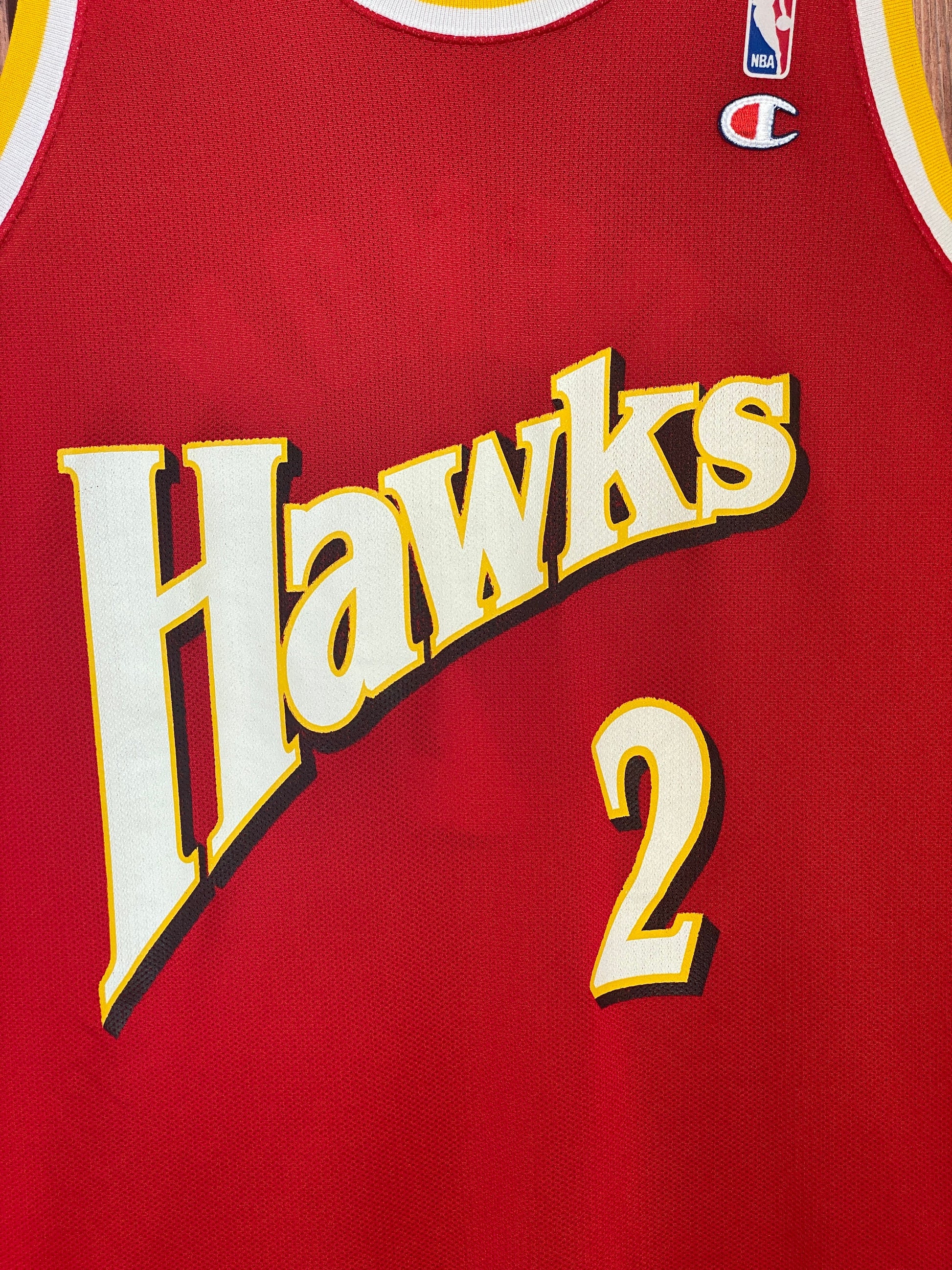 Size 48 Stacey Augmon #2 Hawks 90s Vintage NBA Jersey - Made by Champion in USA - Front View