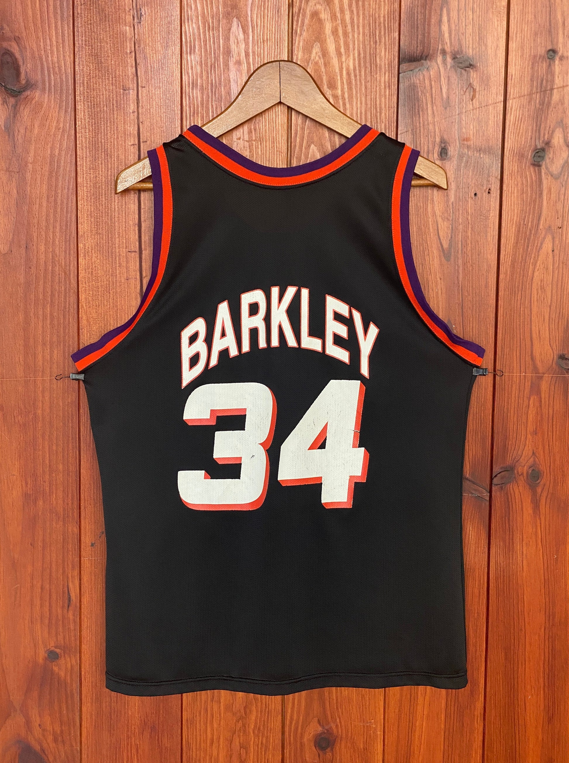 Vintage 90s NBA Phoenix Suns Charles Barkley #34 jersey, size 44 - back view. Made in USA by Champion.