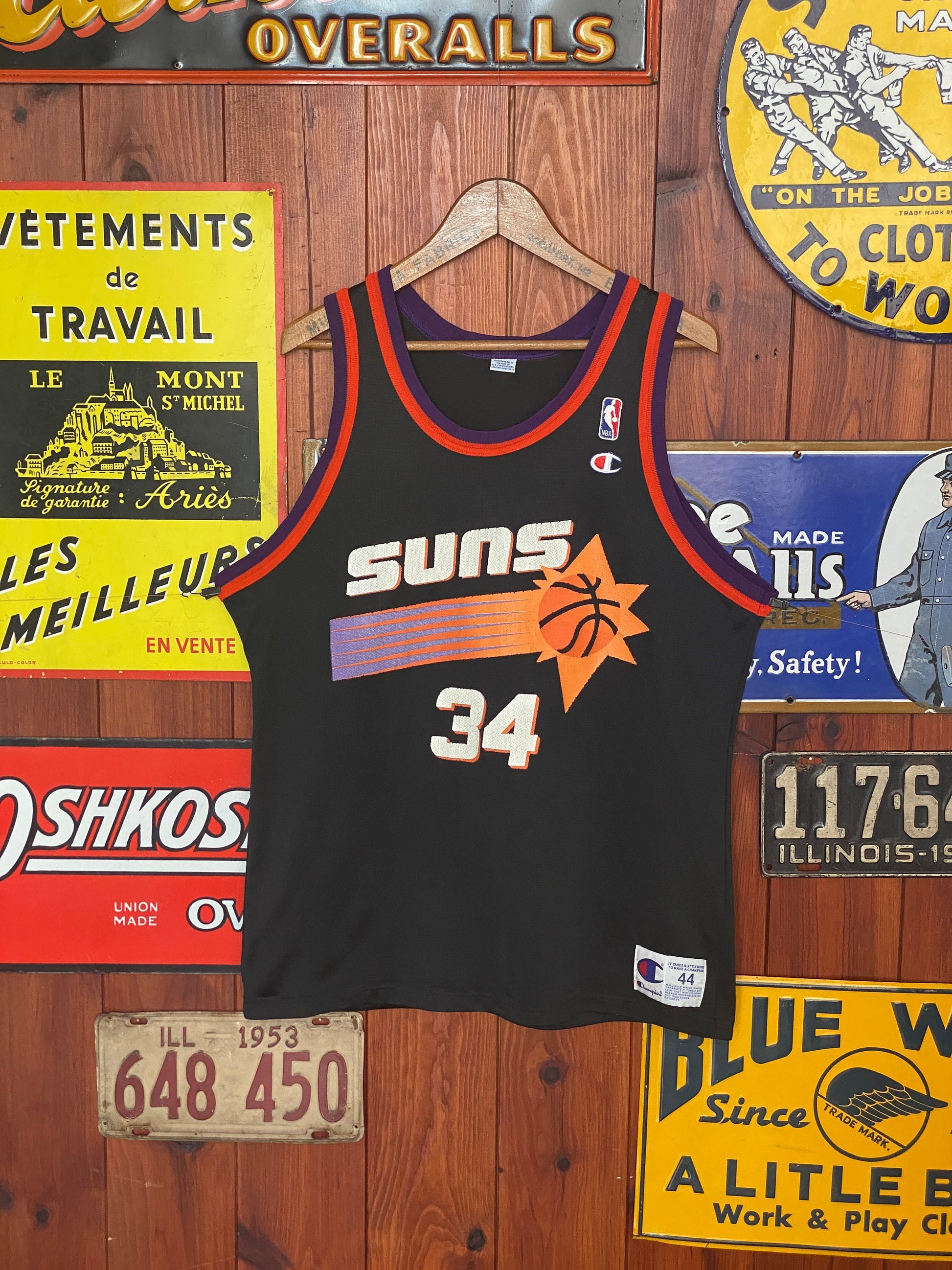 Vintage 90s NBA Phoenix Suns Charles Barkley #34 jersey, size 44 - front view. Made by Champion.
