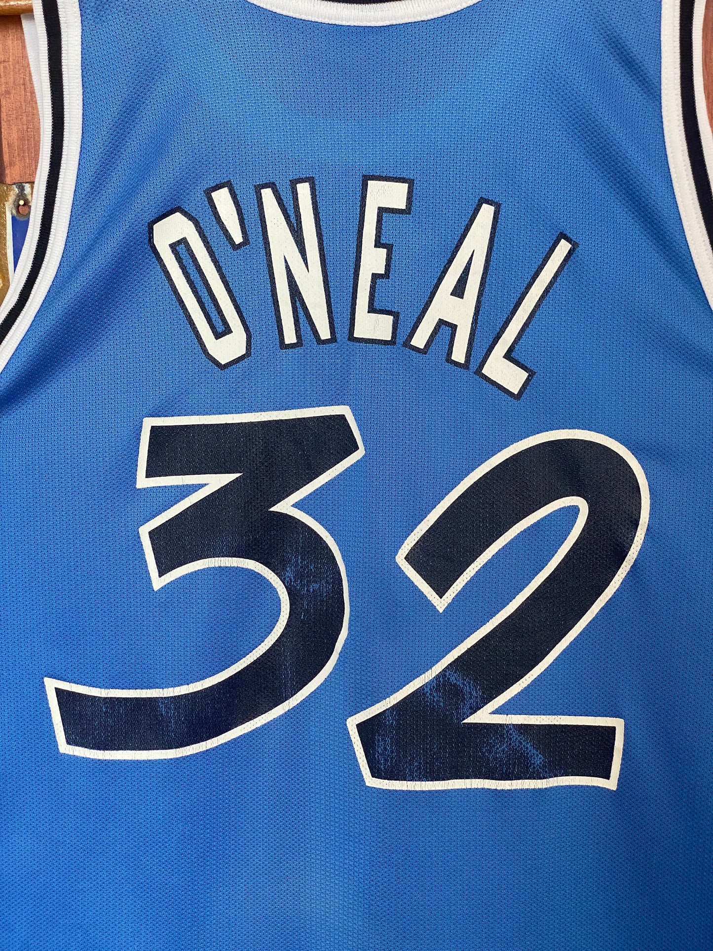  Vintage 90s Orlando NBA jersey with player O'Neal #32, size 48 - front view. Made by Champion.