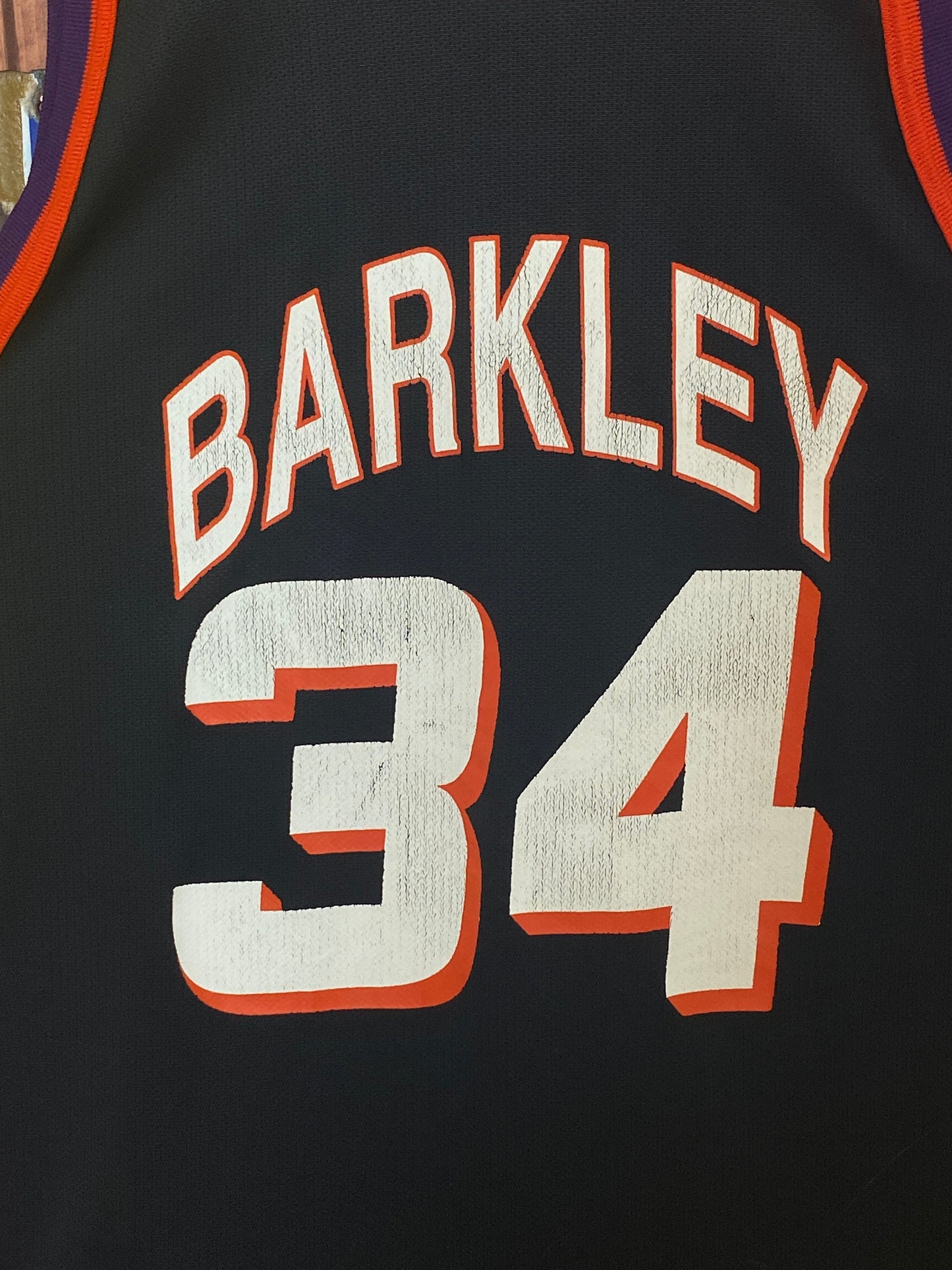 Vintage 90s NBA Phoenix Suns Charles Barkley #34 jersey, size 44 - back view. Made by Champion.
