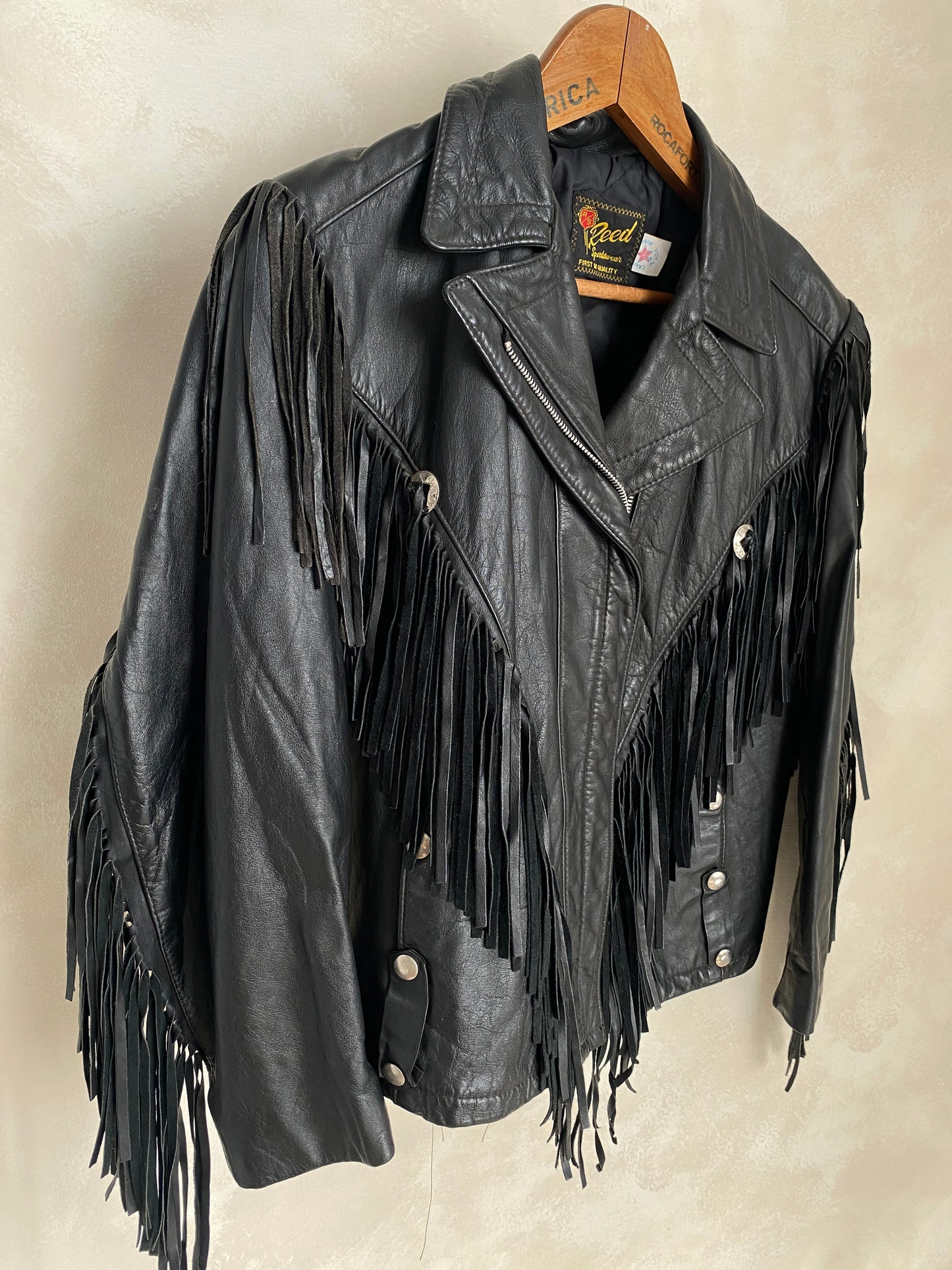 Size Small. Vintage leather fringe motorcycle jacket Made in USA