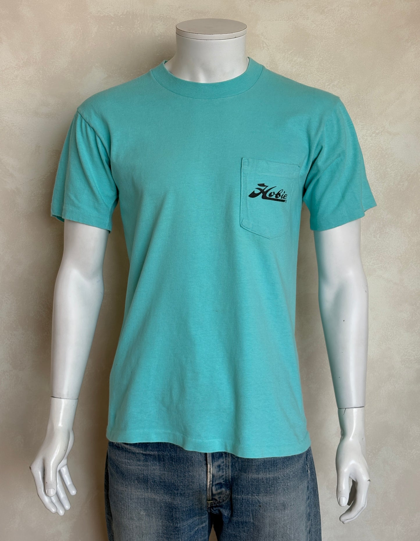 Vintage Hobie Cat sailing tee – vibrant 80s beach scene with colorful catamarans. Large