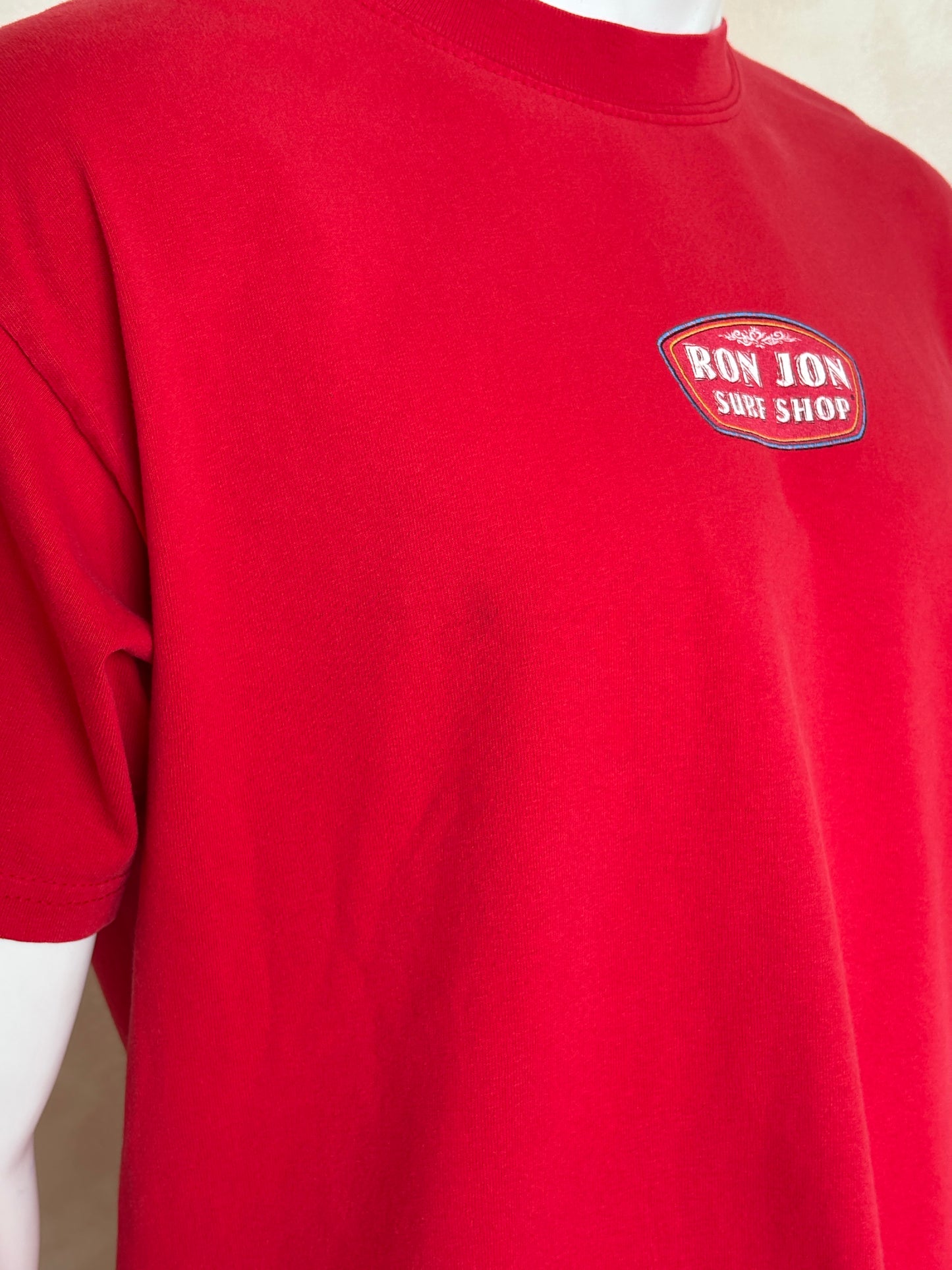 Vintage Ron Jon Surf Shop tee – bold comic-style surfer graphic with pure 90s beach energy. Large