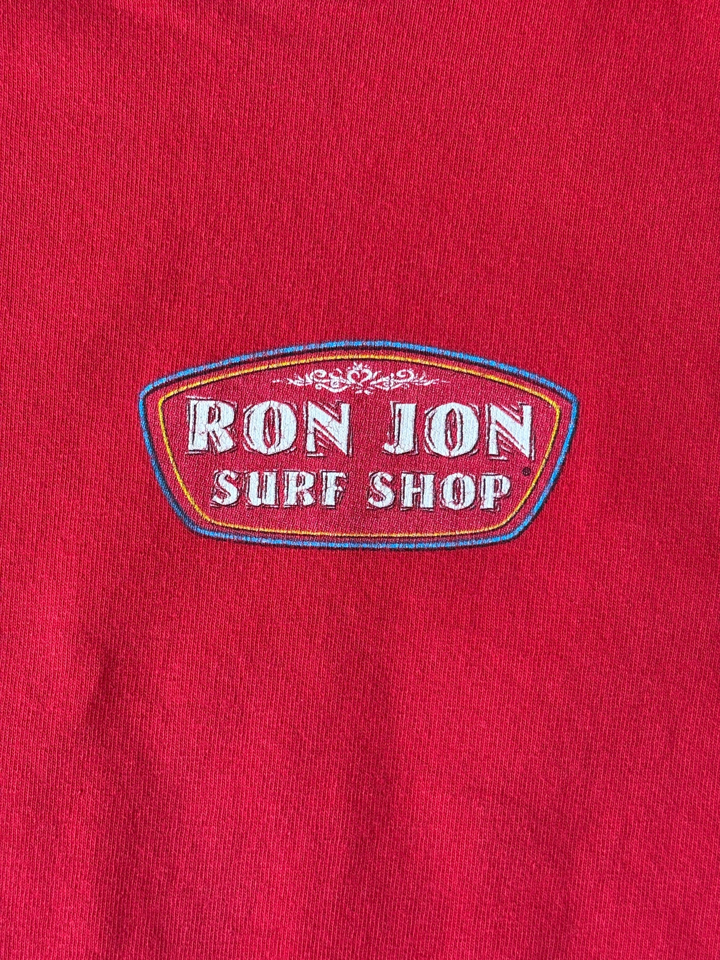 Vintage Ron Jon Surf Shop tee – bold comic-style surfer graphic with pure 90s beach energy. Large