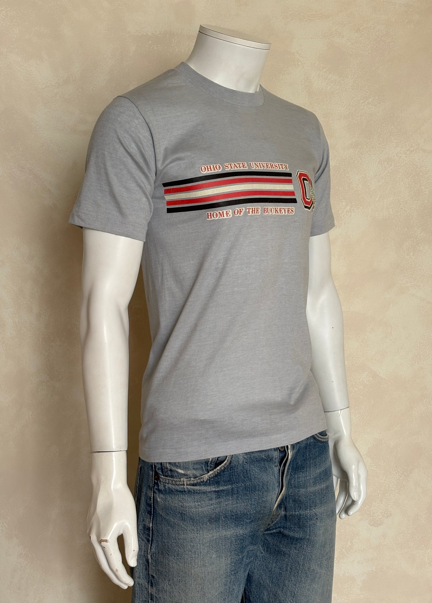 Vintage Ohio State University tee – bold Buckeyes pride with classic athletic stripes. Med