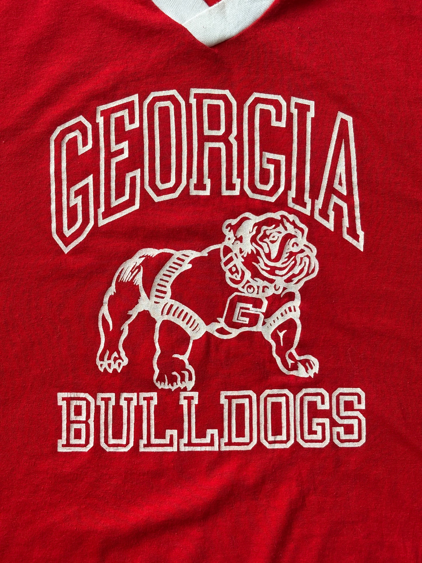 Vintage 90s Georgia Bulldogs jersey tee – bold collegiate style with classic mascot print. XL