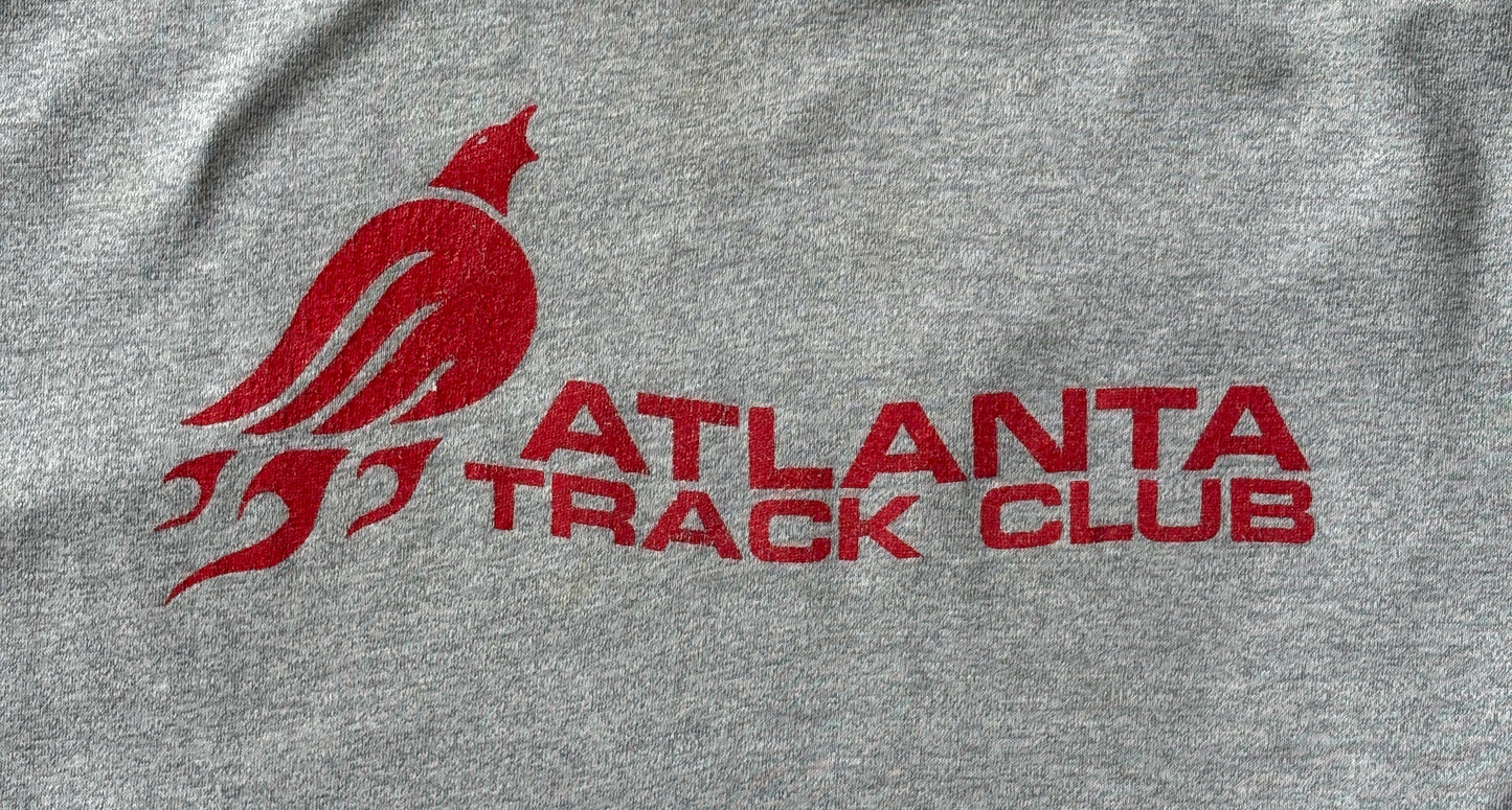 Vintage Atlanta Track Club tee – sleek athletic style from a legendary running scene. Large