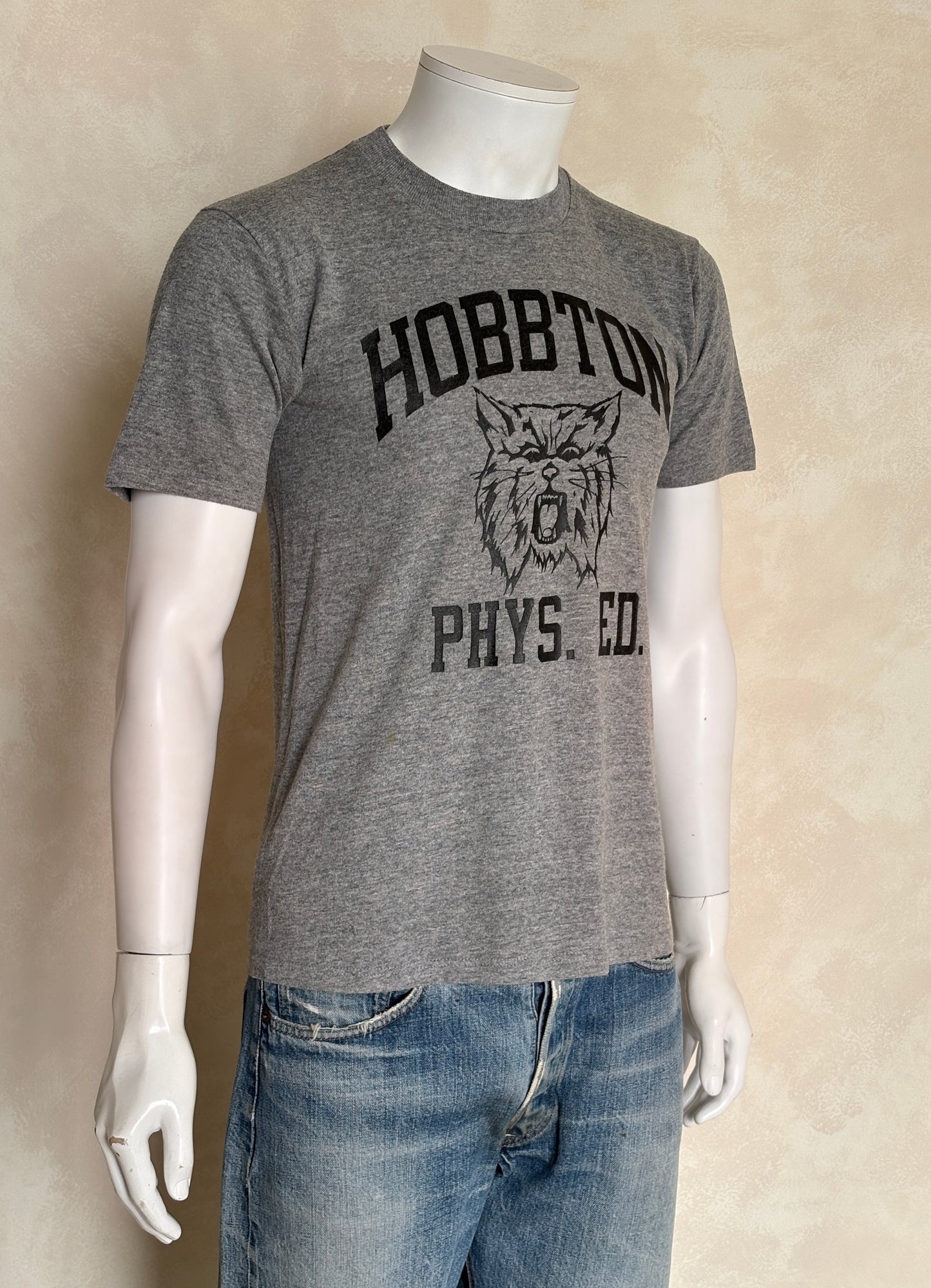 Vintage Hobbtown Phys. Ed. T-Shirt – Classic heather gray gym tee with wildcat mascot graphic. Med