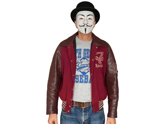 Size Med. Distressed Vintage varsity style jacket Made in Canada