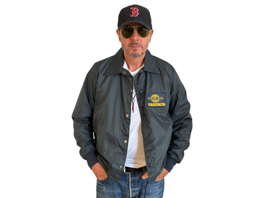 Size Med. Vintage 80s windbreaker. Made in USA