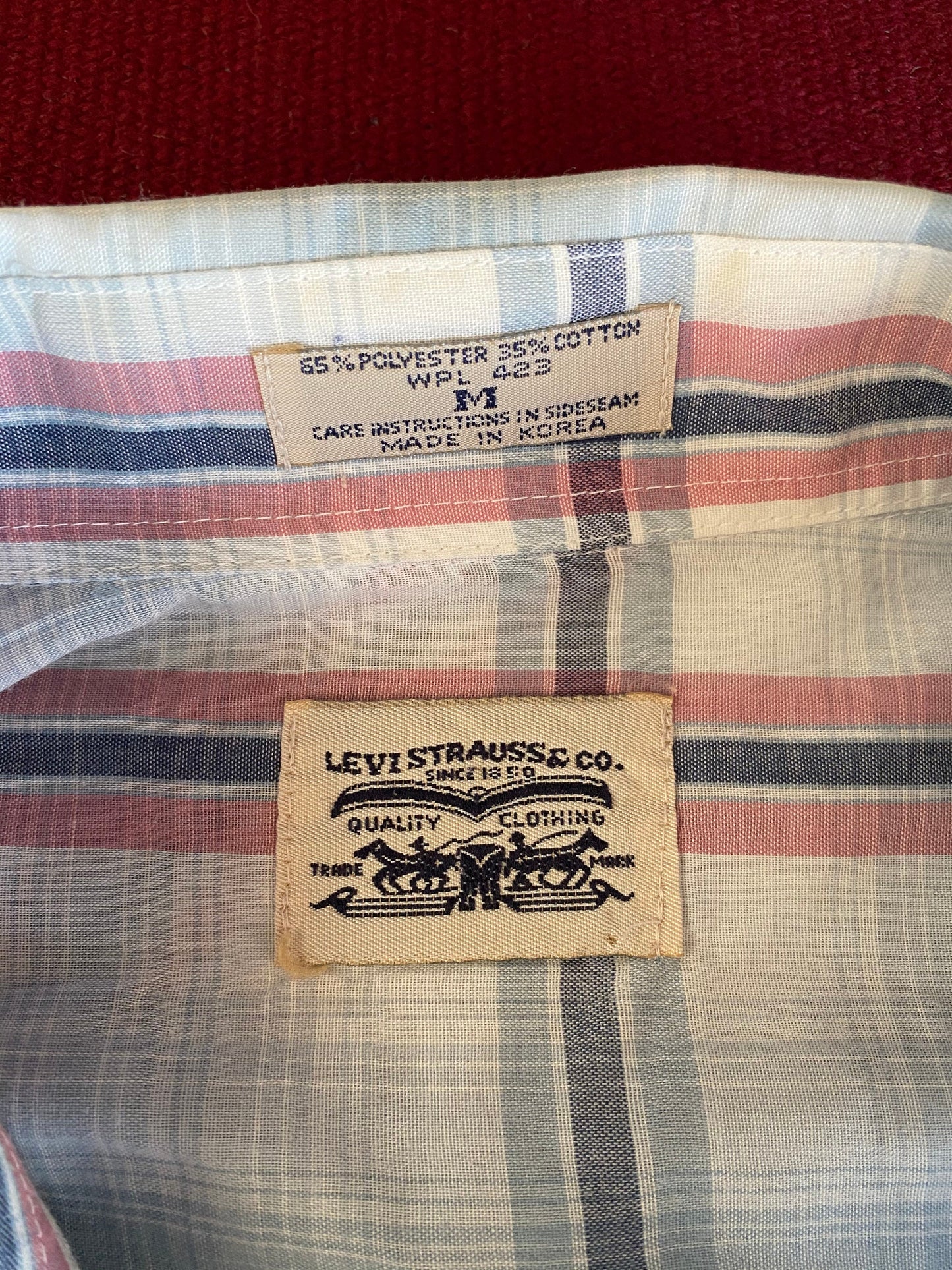 Size M. Vintage plaid 80s western shirt made by LEVIS