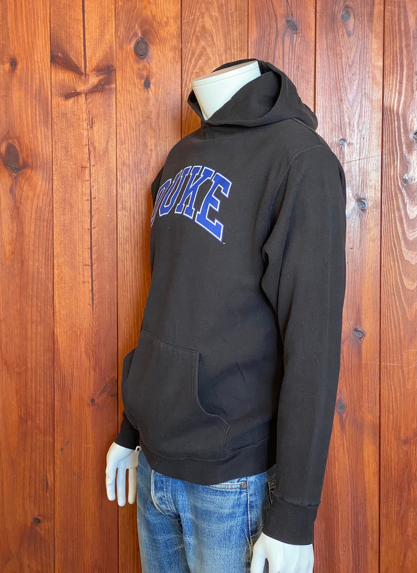 Vintage hooded sweatshirt made in the USA by The Cotton Exchange, size M - Classic American style and quality craftsmanship.