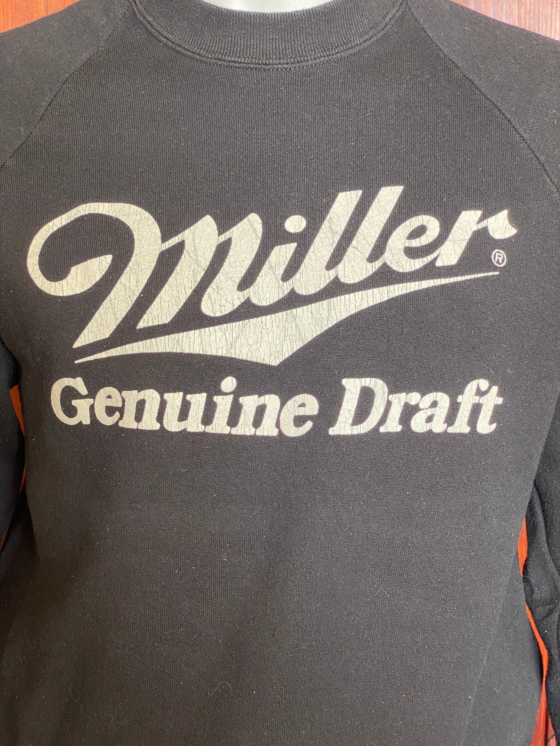 Raglan sleeve 80s Miller Genuine Draft vintage sweatshirt, size M - Classic style and comfortable wear for retro enthusiasts.