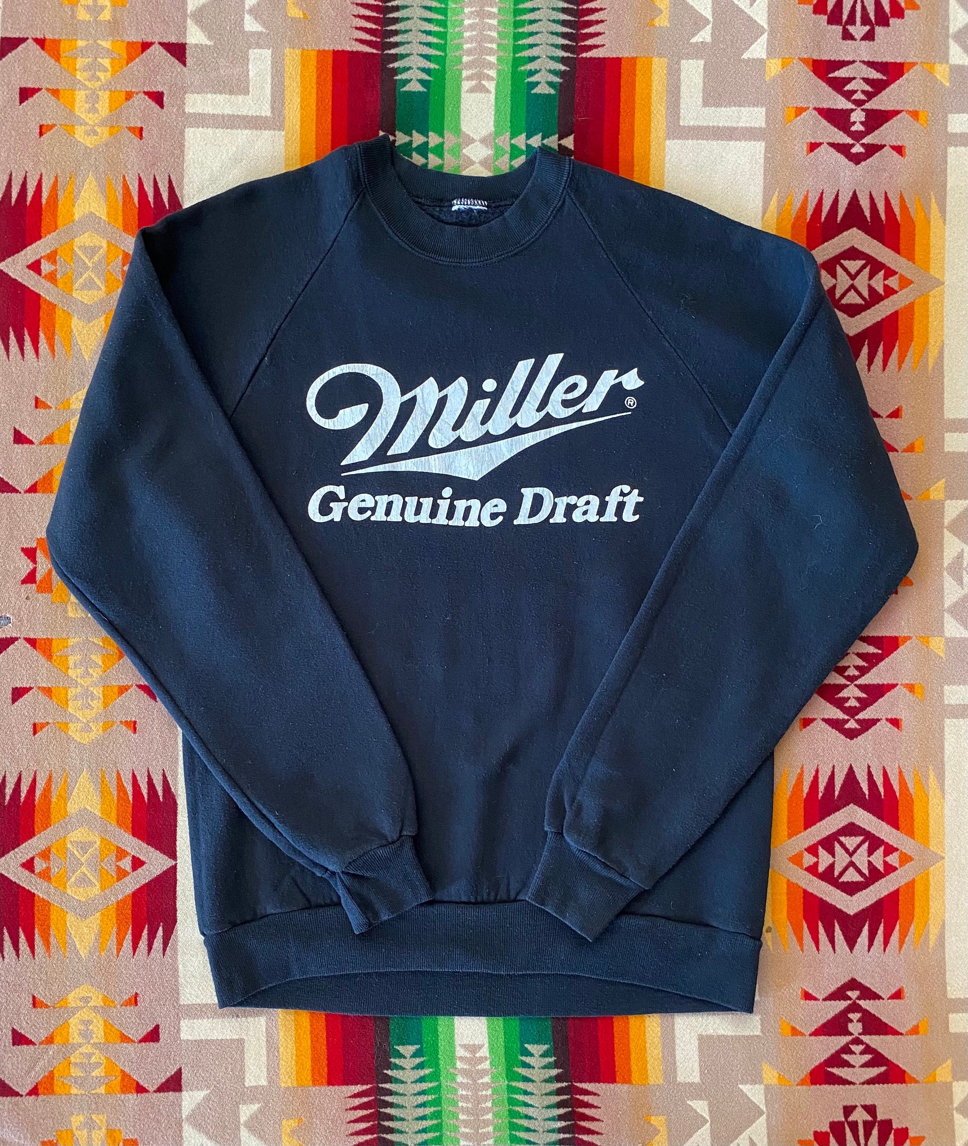 Raglan sleeve 80s Miller Genuine Draft vintage sweatshirt, size M - Classic style and comfortable wear for retro enthusiasts.