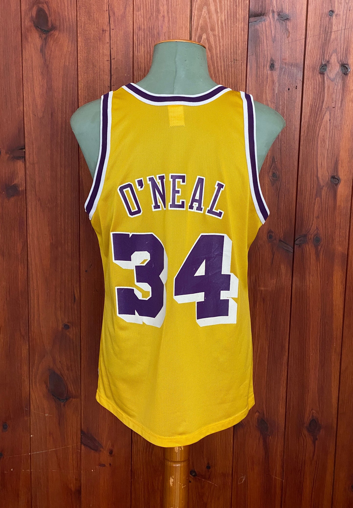 Vintage NBA Champion jersey LA Lakers with player O'Neal #34, size 44 - back view.