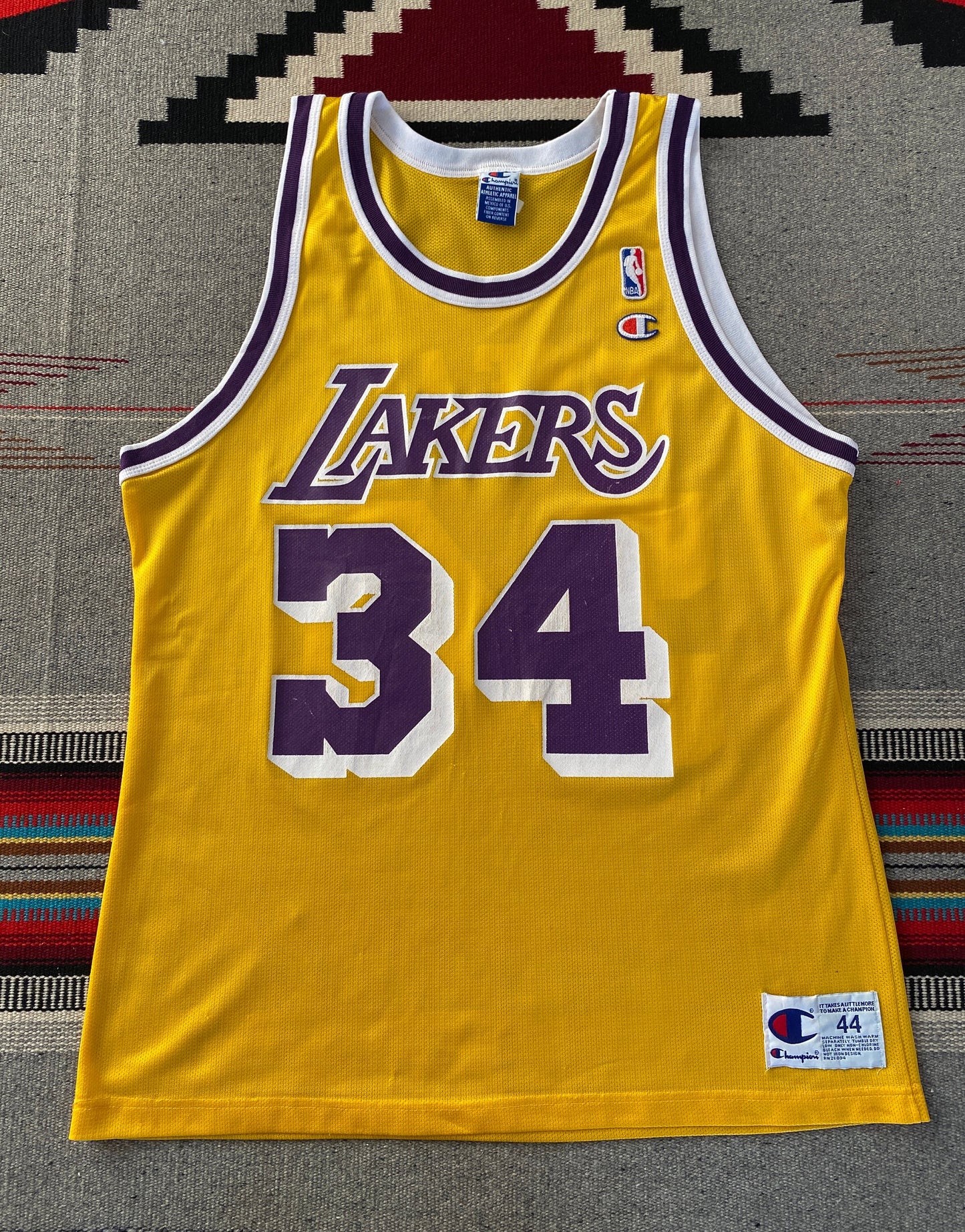 Vintage NBA Champion jersey LA Lakers with player O'Neal #34, size 44 - front view.