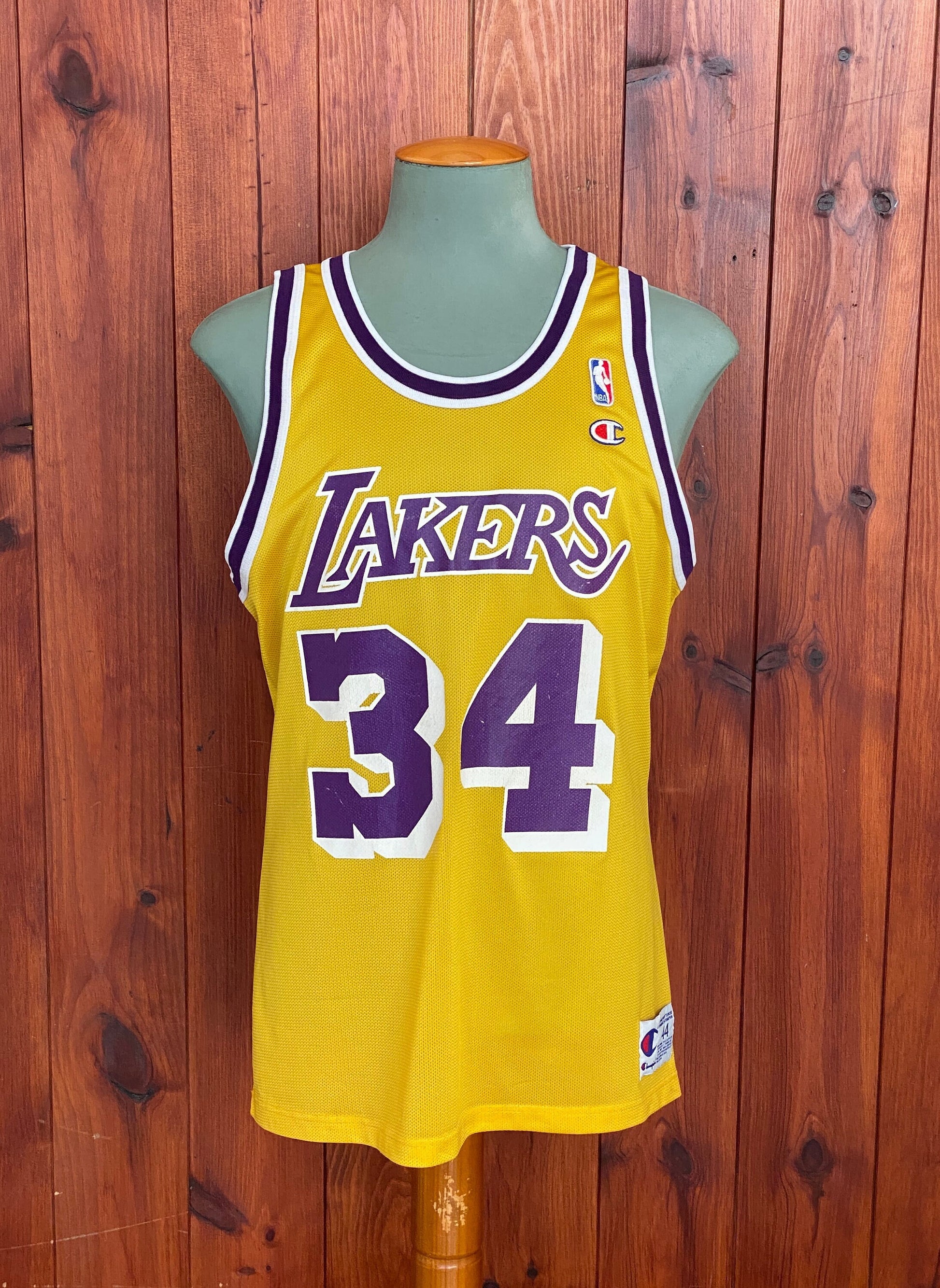 Vintage NBA Champion jersey LA Lakers with player O'Neal #34, size 44 - front view.