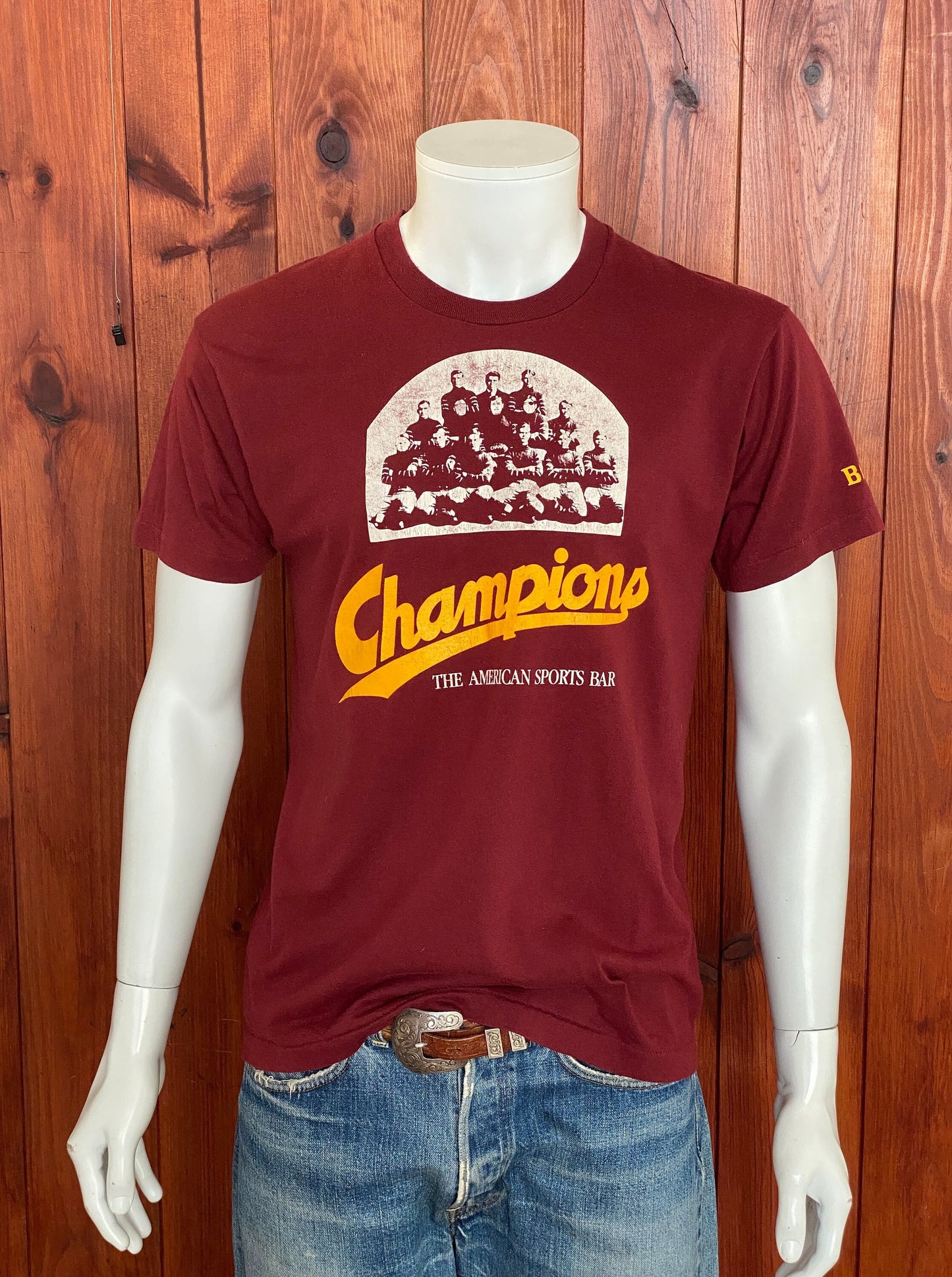 Large. Vintage 50/50 cotton 80s Champions Sports Bar  t shirt Made In USA