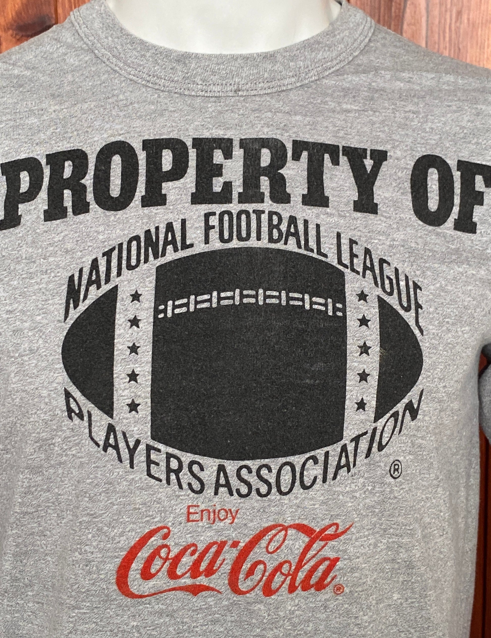 Vintage 80s "Property of Coca Cola" T-shirt, 50/50 cotton, made in the USA, size Medium - Retro style and timeless comfort.