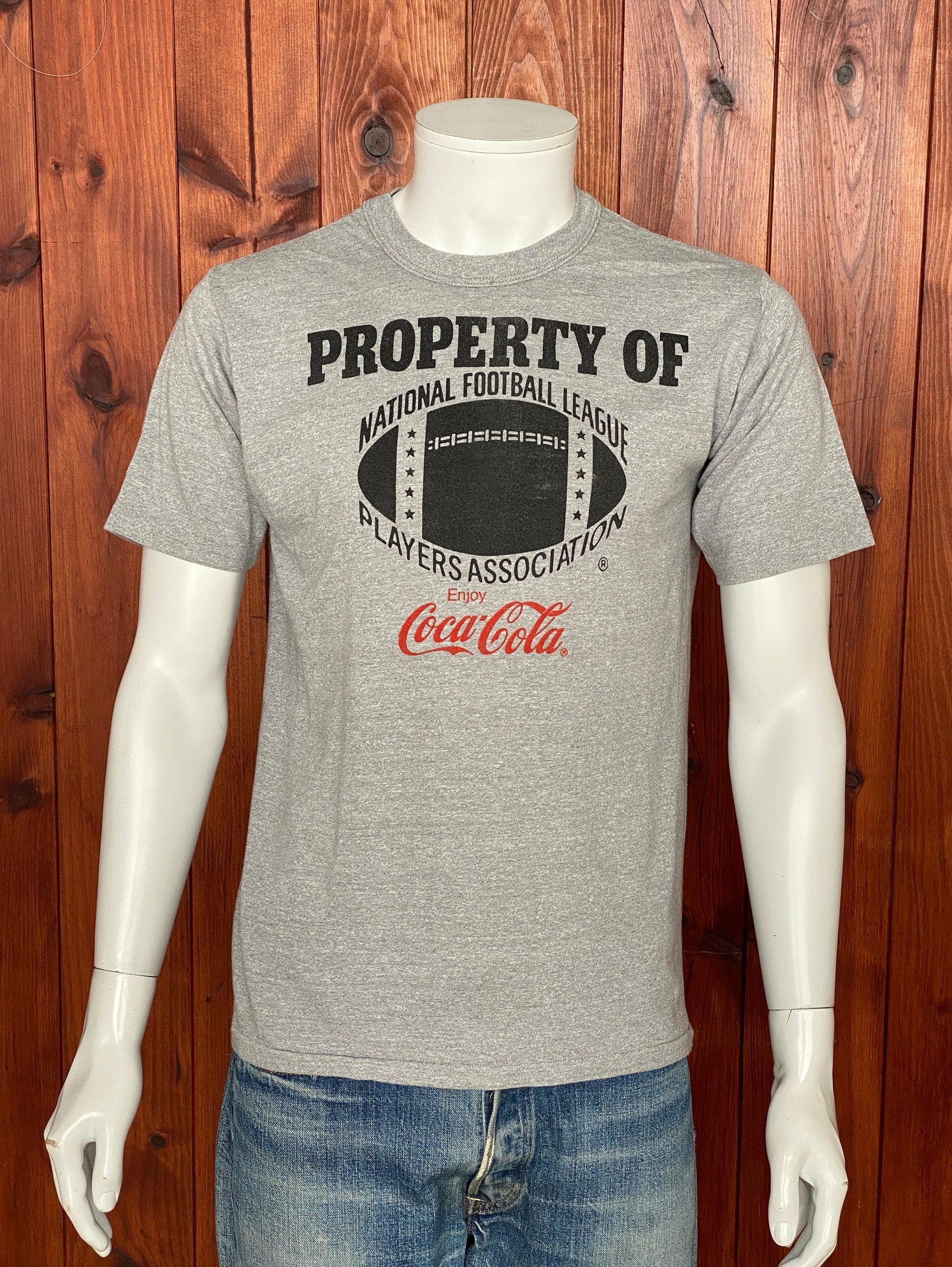 Vintage 80s "Property of Coca Cola" T-shirt, 50/50 cotton, made in the USA, size Medium - Retro style and timeless comfort.