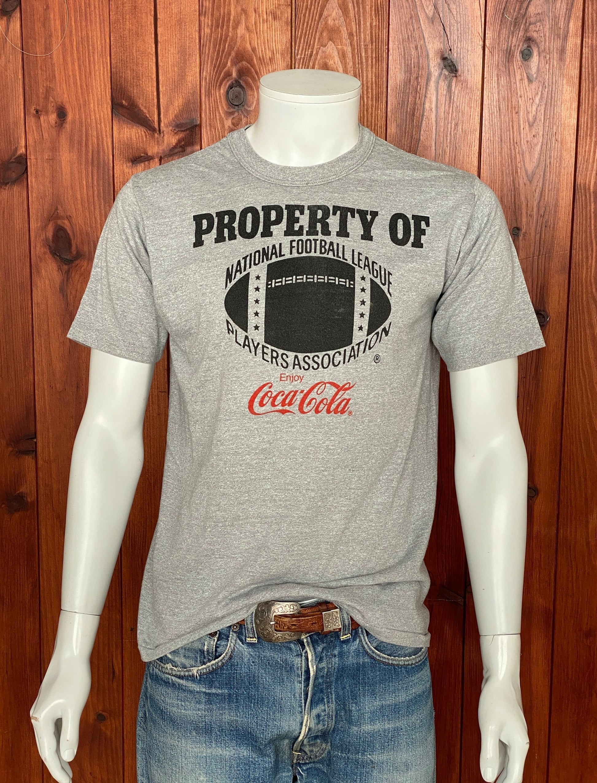 Vintage 80s "Property of Coca Cola" T-shirt, 50/50 cotton, made in the USA, size Medium - Retro style and timeless comfort.