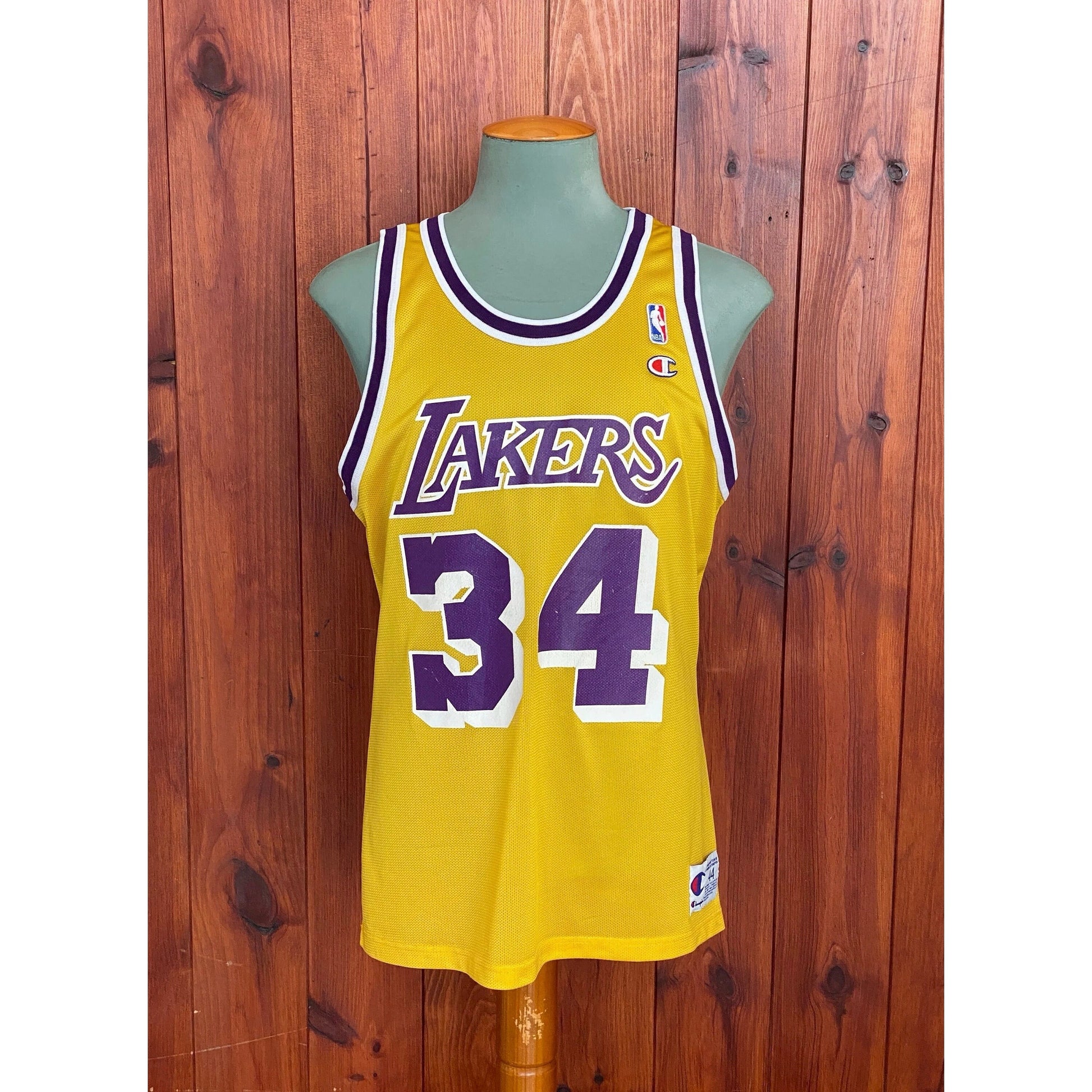 Vintage NBA Champion jersey LA Lakers with player O'Neal #34, size 44 - front view.